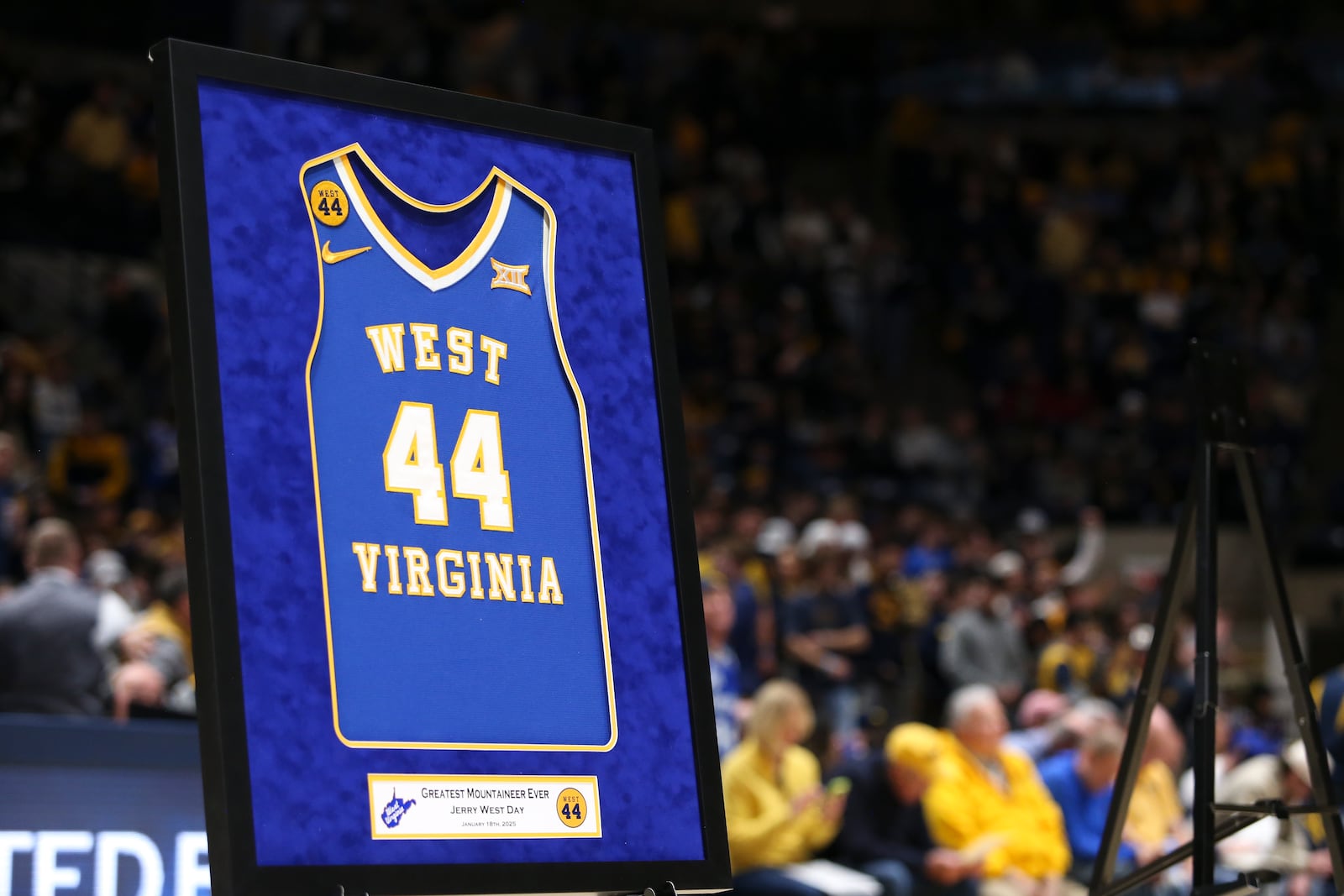 West Virginia hall of famer, Jerry West's number was officially retired from all WVU sports during the first half of an NCAA college basketball game, Saturday, Jan. 18, 2025, in Morgantown, W.Va. (AP Photo/William Wotring)