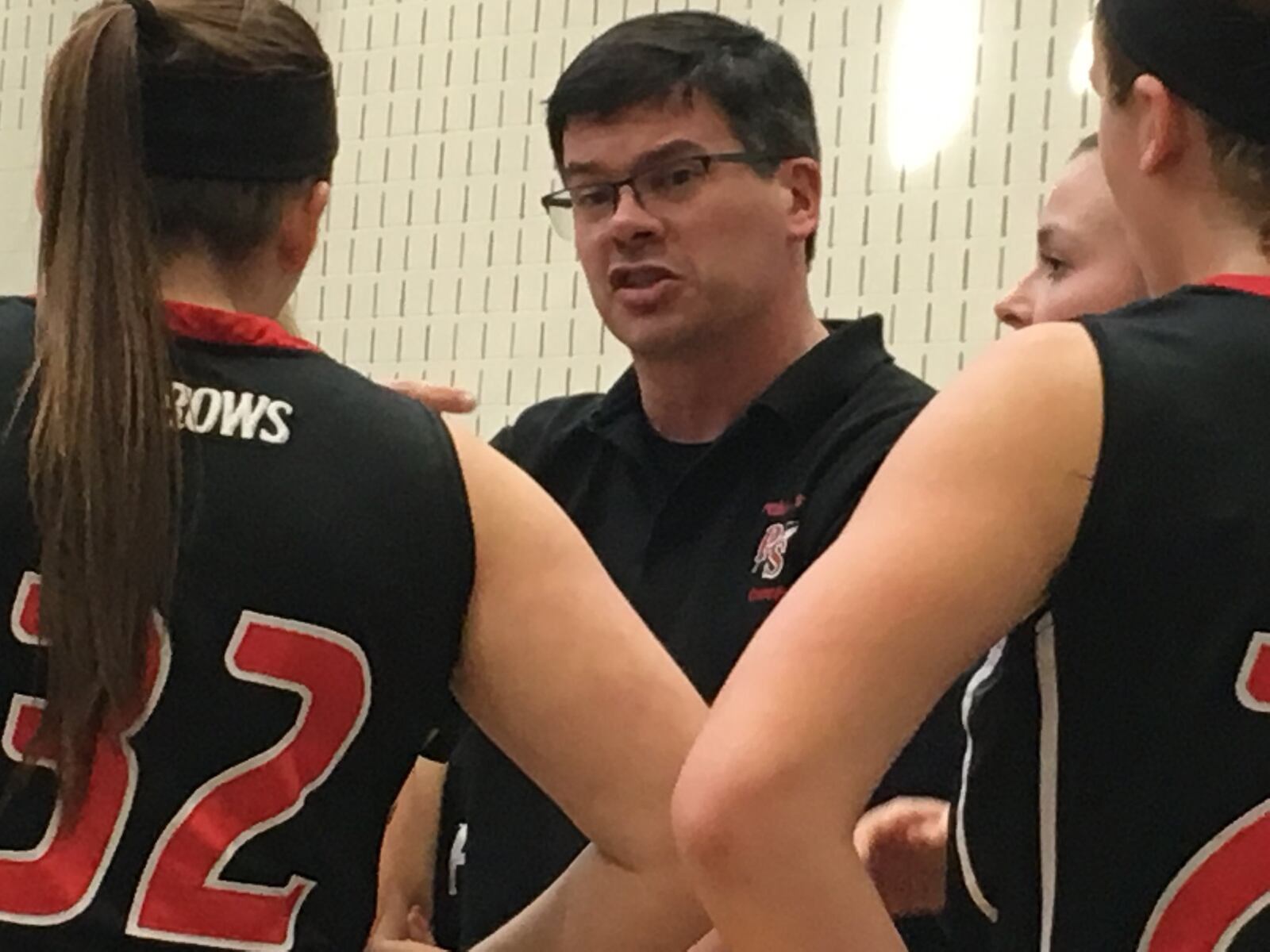 Preble Shawnee coach Kevin Schaeffer talks to his team during a timeout Saturday in a Division III sectional game against Carlisle at Franklin Monroe. RICK CASSANO/STAFF