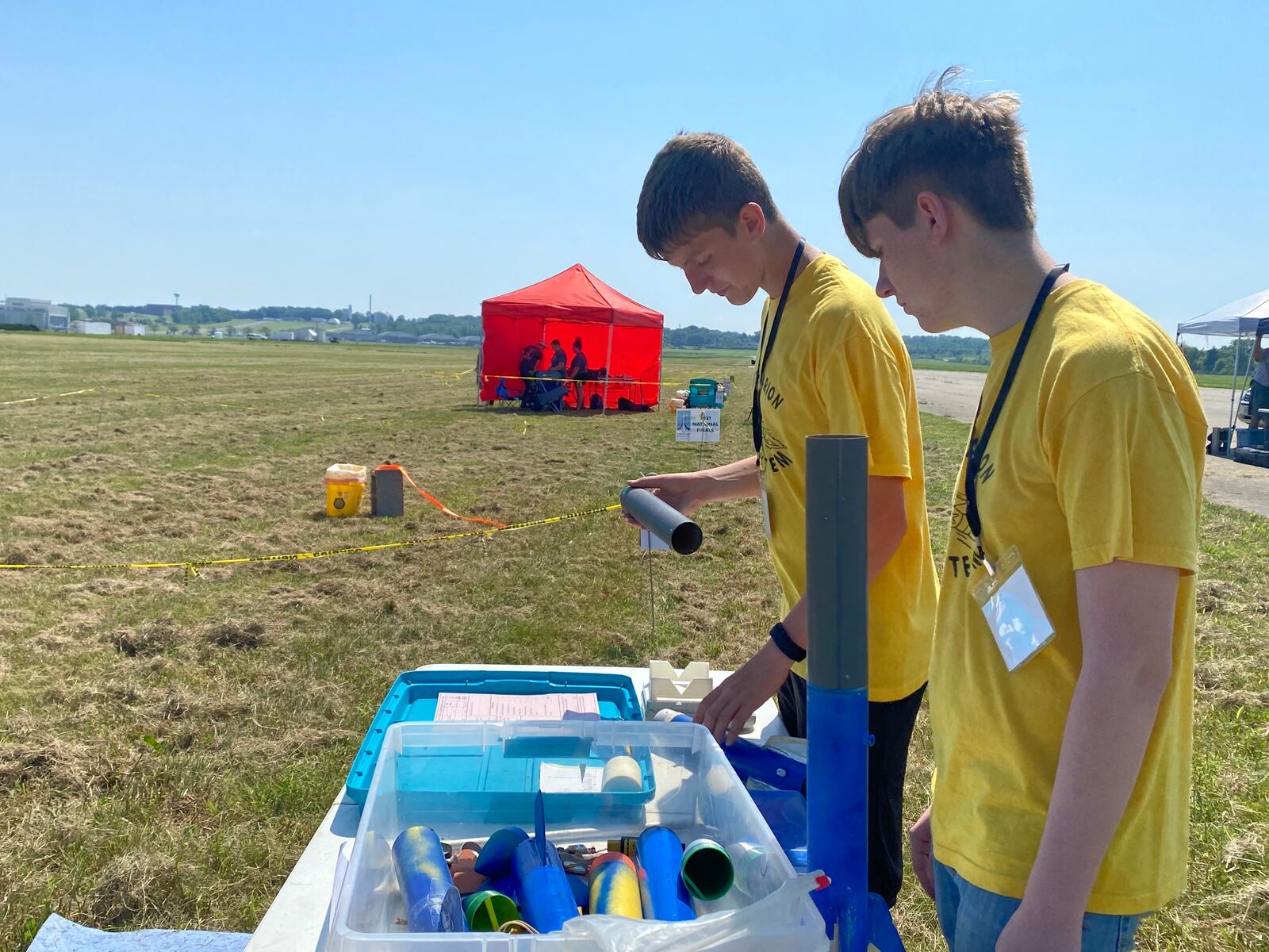 Gage Willis, left, and Billy Satterfield, right, of North Marion High School, Farmington, West Virginia, prepare to competition in The American Rocketry Challenge at the Air Force Museum on Saturday. Eileen McClory / STAFF