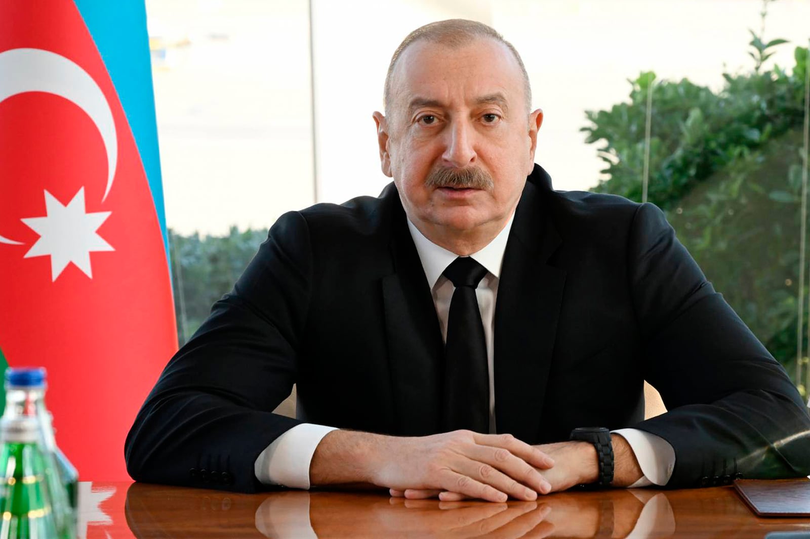 In this photo provided by Azerbaijan's Presidential Press Office, Azerbaijani President Ilham Aliyev holds a meeting in Baku, Wednesday, Dec. 25, 2024 following an Azerbaijan Airlines Embraer 190 plane crash. (Azerbaijani Presidential Press Office via AP)