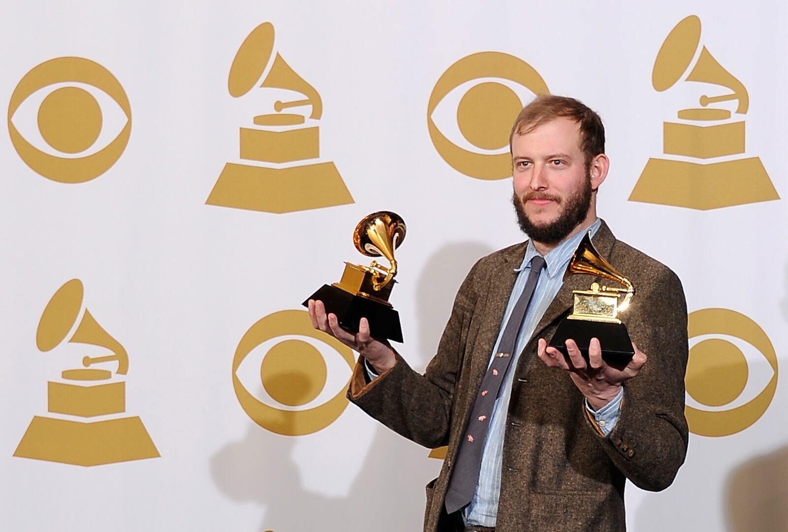 Musician Justin Vernon of Bon Iver, winner of the GRAMMYs for Best Alternative Music Album for "Bon Iver" and Best New Artist, poses in the press room at the 54th Annual GRAMMY Awards at Staples Center on February 12, 2012 in Los Angeles, California. He will be playing a concert in Newport, Ky. on June 21. 