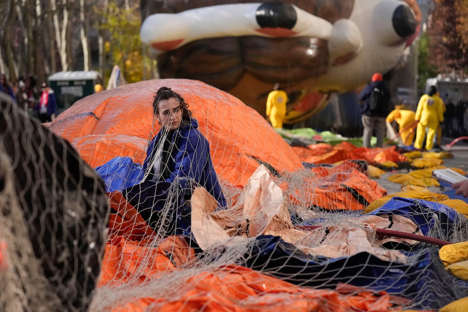 Ash Ditaranto helps to inflate a float in preparation for the Macy's Thanksgiving Day Parade in New York, Wednesday, Nov. 27, 2024. (AP Photo/Seth Wenig)