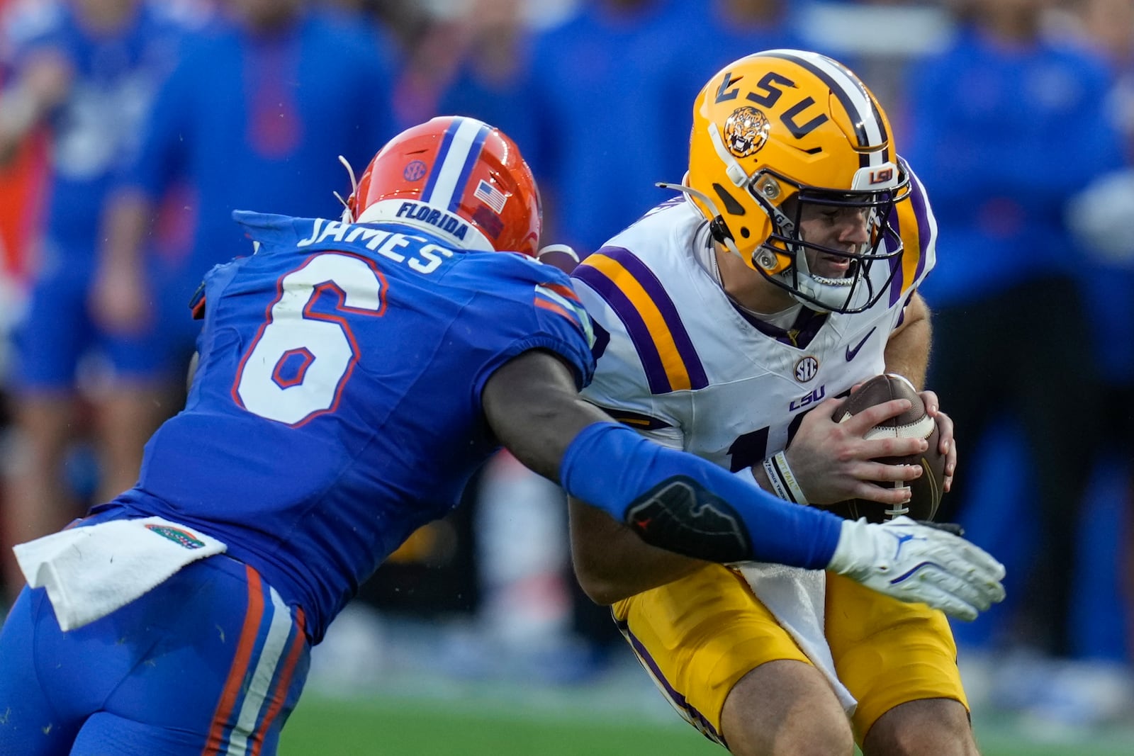 Florida linebacker Shemar James (6) sacks LSU quarterback Garrett Nussmeier during the first half of an NCAA college football game, Saturday, Nov. 16, 2024, in Gainesville, Fla. (AP Photo/John Raoux)