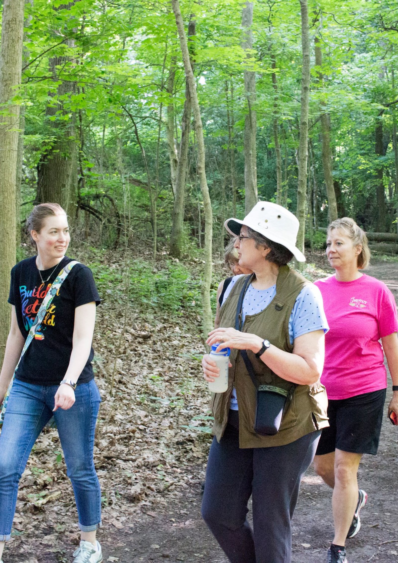 The Winters-Bellbrook Community Library’s Walk and Talk Book Club discussed Bill Bryson s “A Walk in the Woods” while hiking through Sweet Arrow Reserve on June 17. CONTRIBUTED