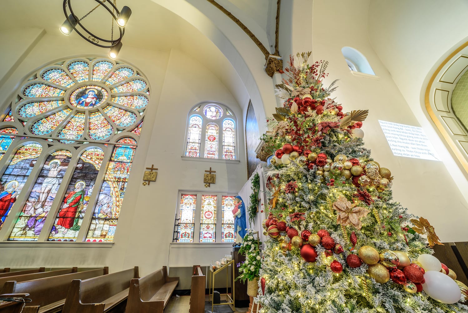 PHOTOS: A look inside Nhà Thờ Thánh Tâm (Sacred Heart Church) in downtown Dayton decorated for Christmas