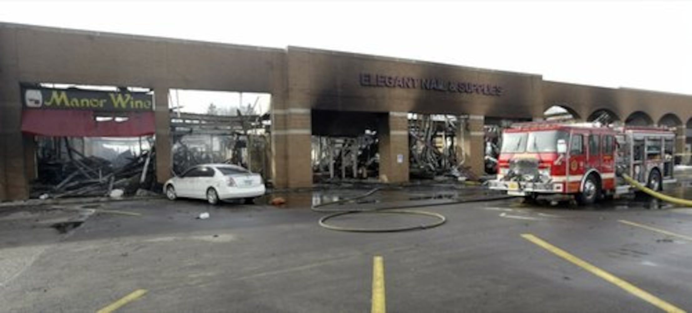 Page Manor shopping center damaged by fire