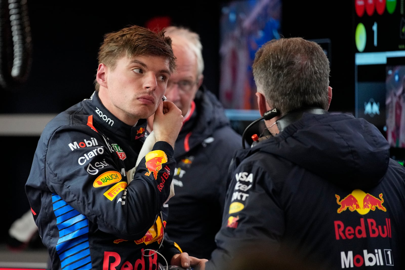 Red Bull driver Max Verstappen, of the Netherlands, talks with his crew after the final practice session for the Formula One U.S. Grand Prix auto race, Friday, Nov. 22, 2024, in Las Vegas. (AP Photo/John Locher)