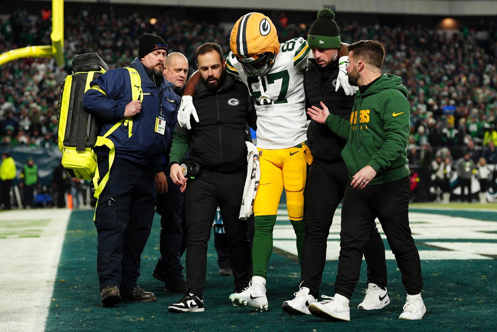 Green Bay Packers wide receiver Romeo Doubs (87) walks off the field after an injury during the second half of an NFL wild-card playoff football game against the Philadelphia Eagles on Sunday, Jan. 12, 2025, in Philadelphia. (AP Photo/Derik Hamilton)