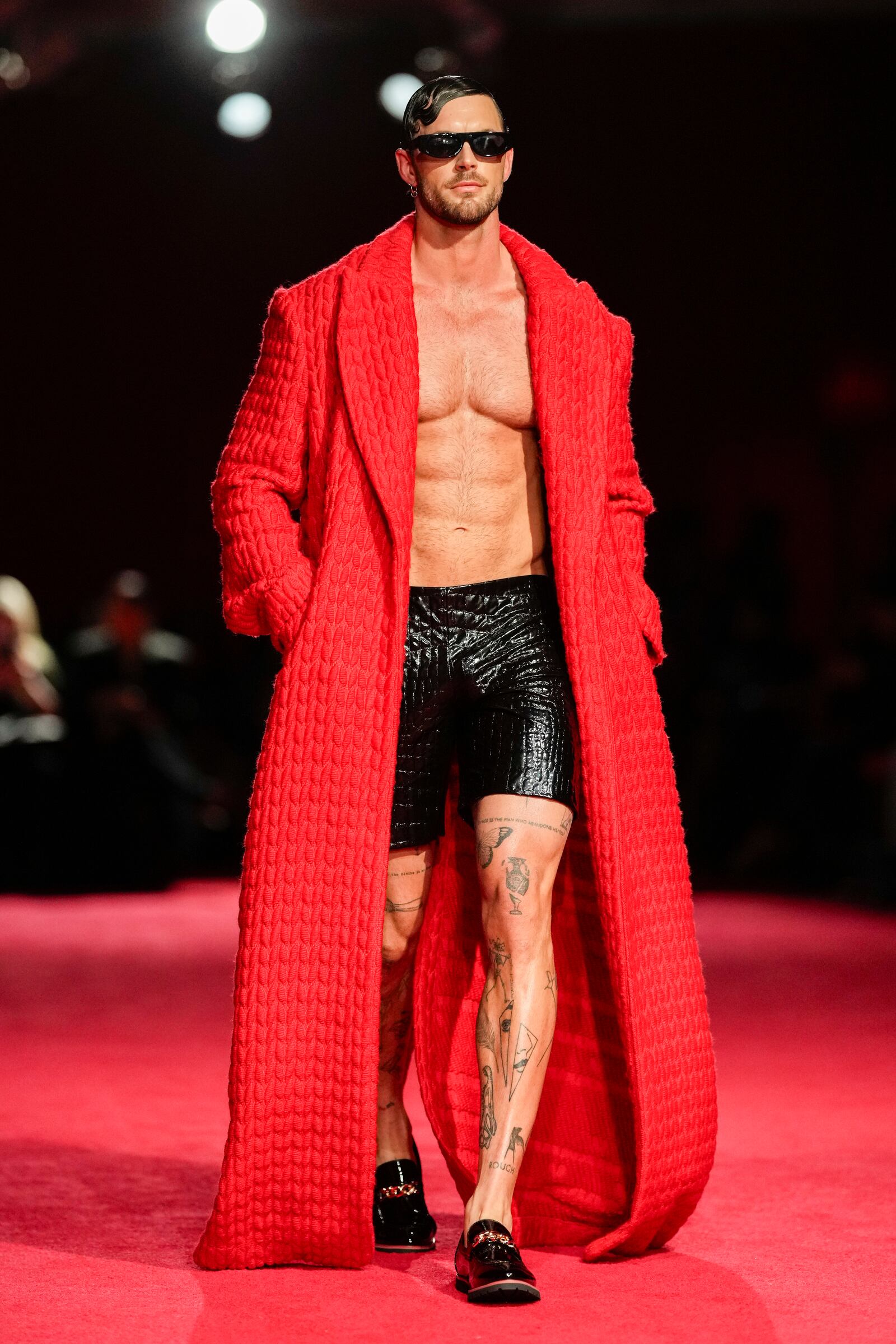 A model walks the runway during the Christian Siriano Fall/Winter 2025 fashion show at Chelsea Industrial during New York Fashion Week on Thursday, Feb. 6, 2025, in New York. (Photo by Charles Sykes/Invision/AP)