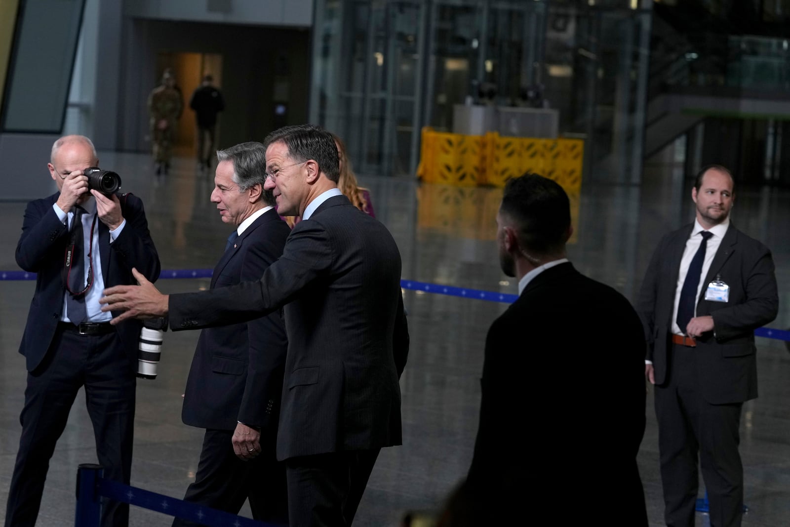 NATO Secretary General Mark Rutte, center right, walks with United States Secretary of State Antony Blinken, center left, prior to delivering a statement at NATO headquarters in Brussels on Wednesday, Nov. 13, 2024. (AP Photo/Virginia Mayo)