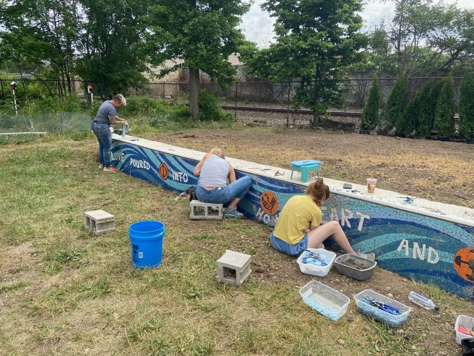 Installation of the Our Town Dayton mosaic project, which will be dedicated June 22. CONTRIBUTED