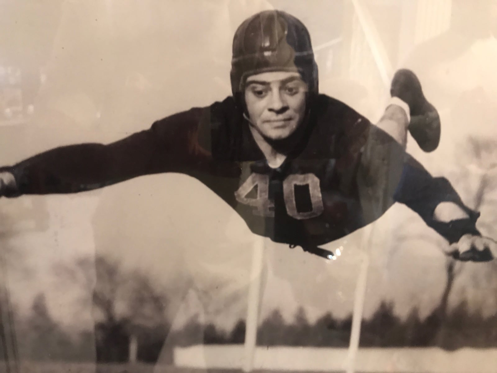 A photo from Jack Giambrone's collection. An airborne Vince Lombardi was a Fordham University guard and one of the famed Seven Blocks of Granite, who made up the team’s front line.  Tom Archdeacon/STAFF