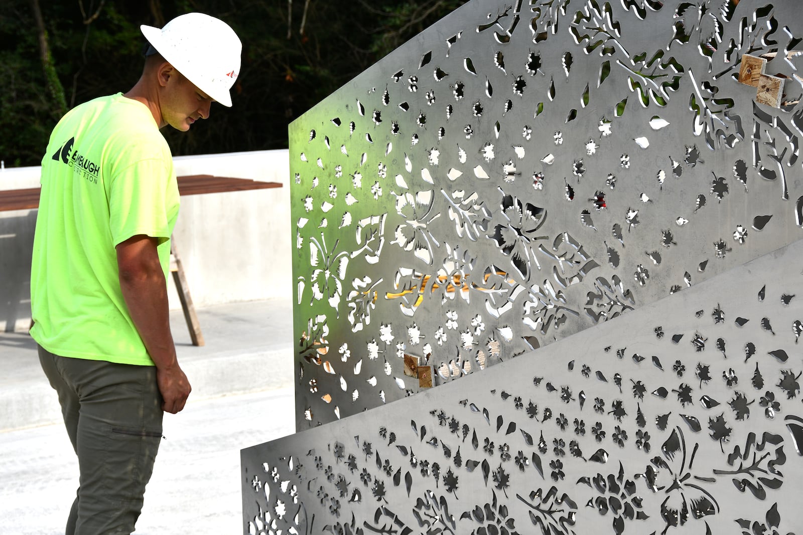  “Foliage,” a new Kettering public artwork, has been installed on the Ridgeway Road bridge. The stainless steel sculpture designed by Cliff Garten Studio in Venice, CA, mimics the landscape found within Hills & Dales MetroPark and Kettering. SHAYNA MCCONVILLE / CITY OF KETTERING