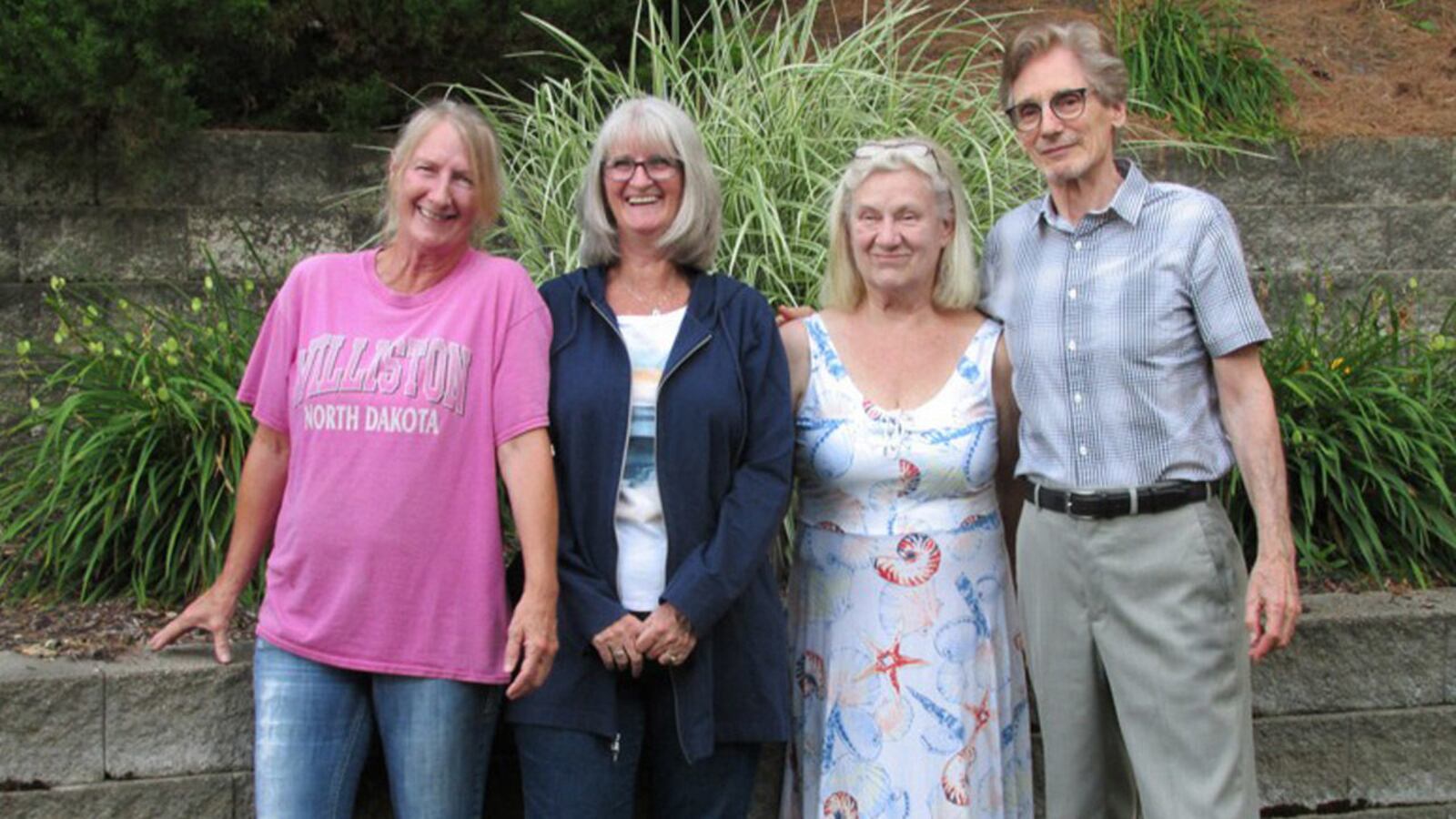 Richard Cole traveled to Iowa to meet his newly-discovered half-siblings, who are, from the left, Cheryl Brooks, Nina McDevitt and Pam Williams.