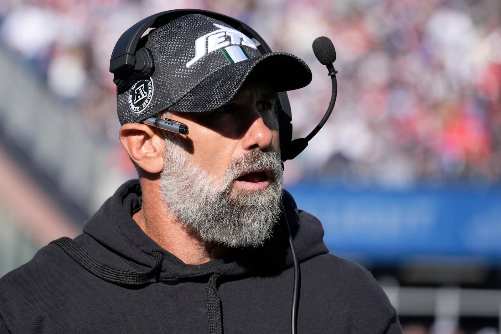 New York Jets interim head coach Jeff Ulbrich shouts to his players from the sidelines in the first half of an NFL football game against the New England Patriots, Sunday, Oct. 27, 2024, in Foxborough, Mass. (AP Photo/Michael Dwyer)