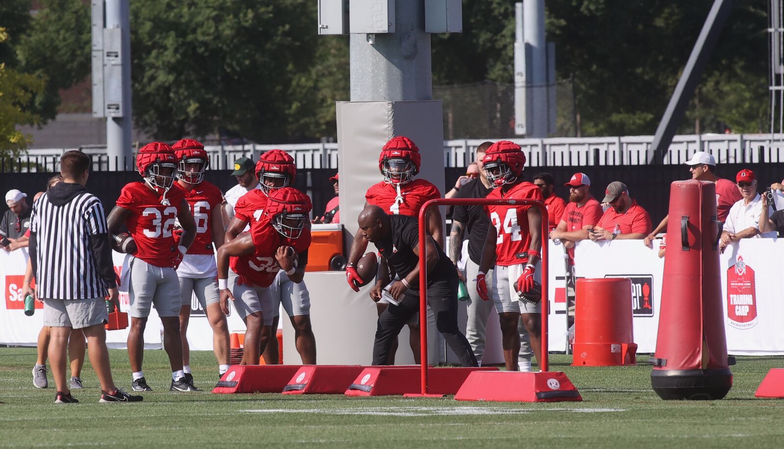 A running back carries the ball at Ohio State football practice of the season on Thursday, Aug. 1, 2024, at the Woody Hayes Athletic Center in Columbus. David Jablonski/Staff