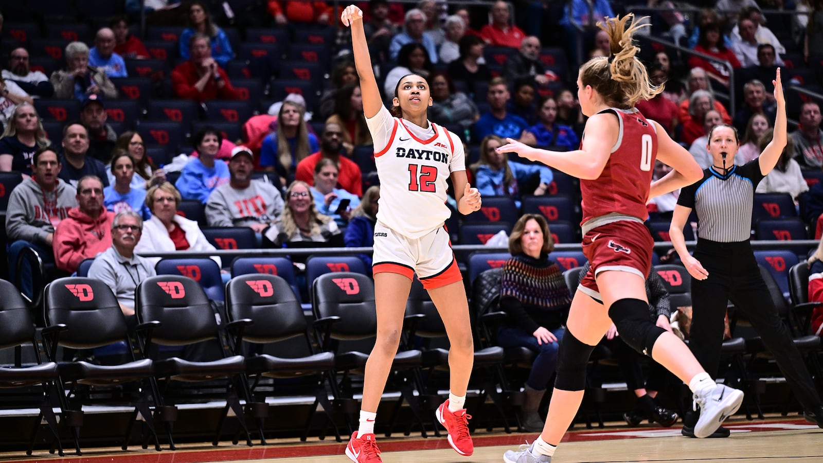 Dayton's Jayda Johnson follows through on a three-point attempt during Wednesday night's game vs. St. Joseph's. Erik Schelkun/UD Athletics