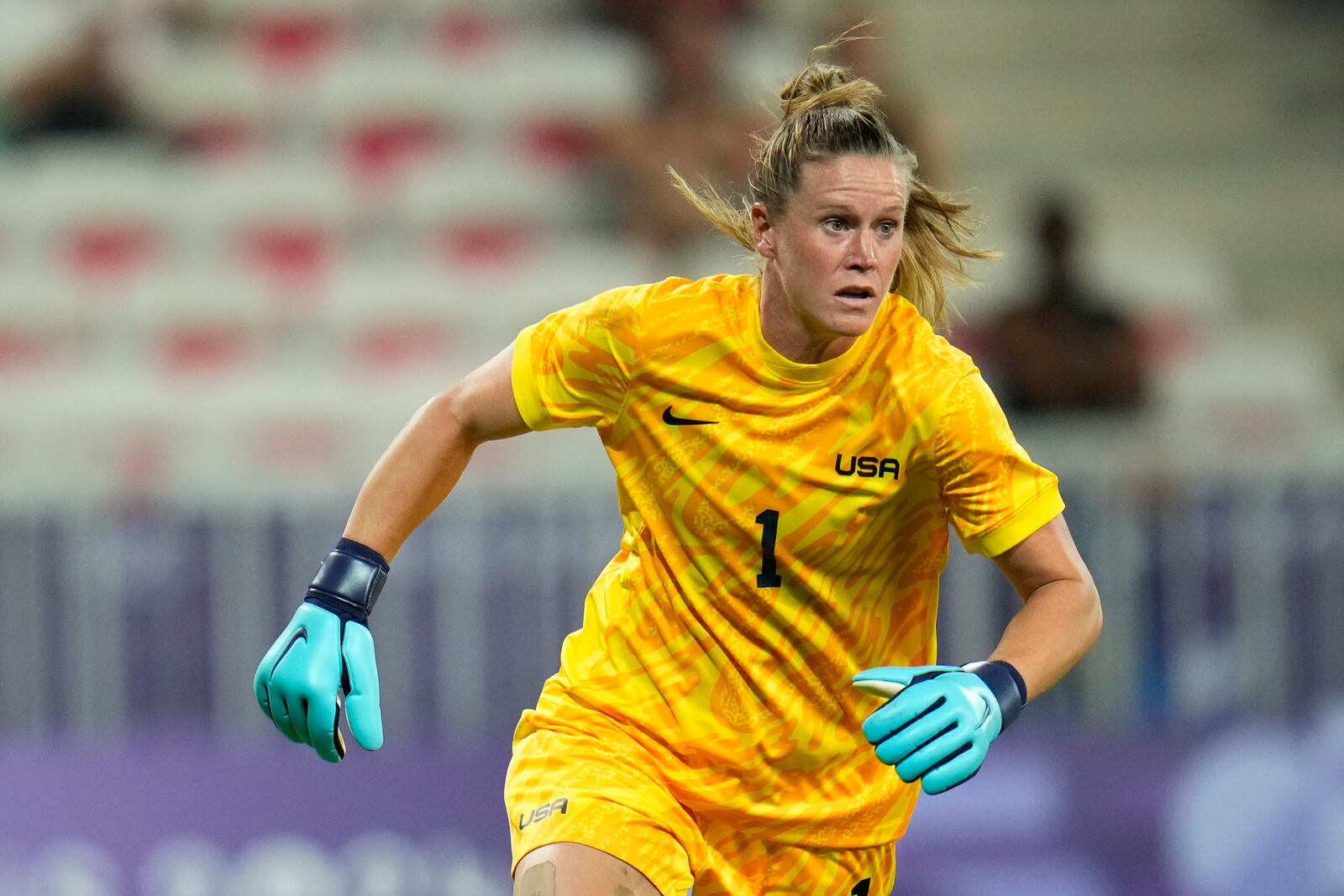 FILE - United States goalkeeper Alyssa Naeher defends her net during a women's group B match between the United States and Zambia at Nice Stadium at the 2024 Summer Olympics, Thursday, July 25, 2024, in Nice, France. (AP Photo/Julio Cortez, File)