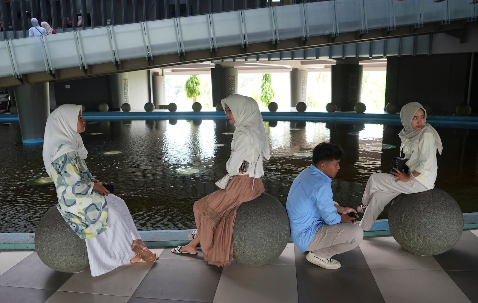 Students visit the Tsunami Museum in Banda Aceh, Indonesia, Saturday, Dec 14, 2024. (AP Photo/Achmad Ibrahim)