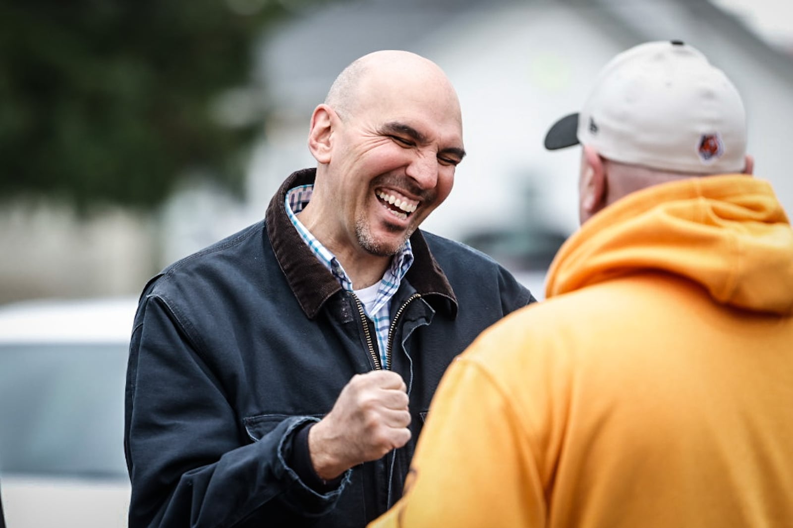 City of Dayton Commissioner Matt Joseph talks with poll volunteer Richard Gilbertson at the Our Lady of Immaculate Conception Church on election day May 2, 2023. JIM NOELKER/STAFF