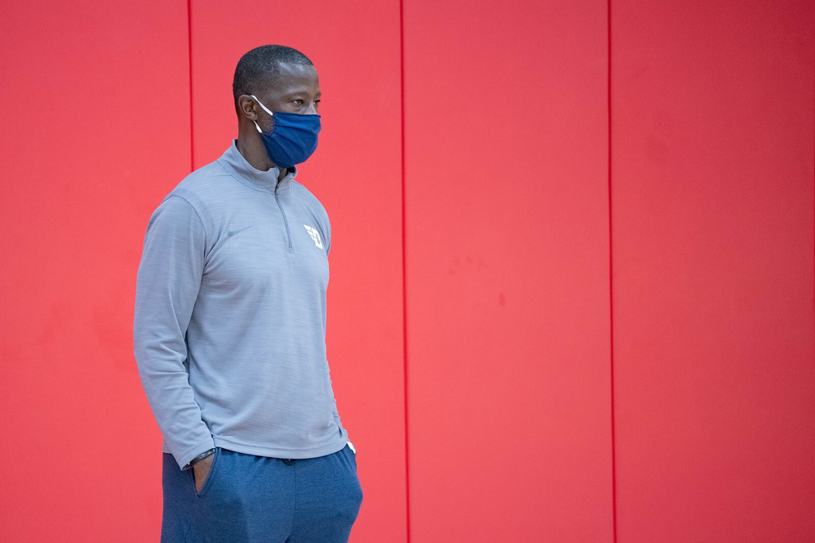 Dayton's Anthony Grant watches practice in September 2020 at the Cronin Center in Dayton. Photo by AJ Schraffenberger