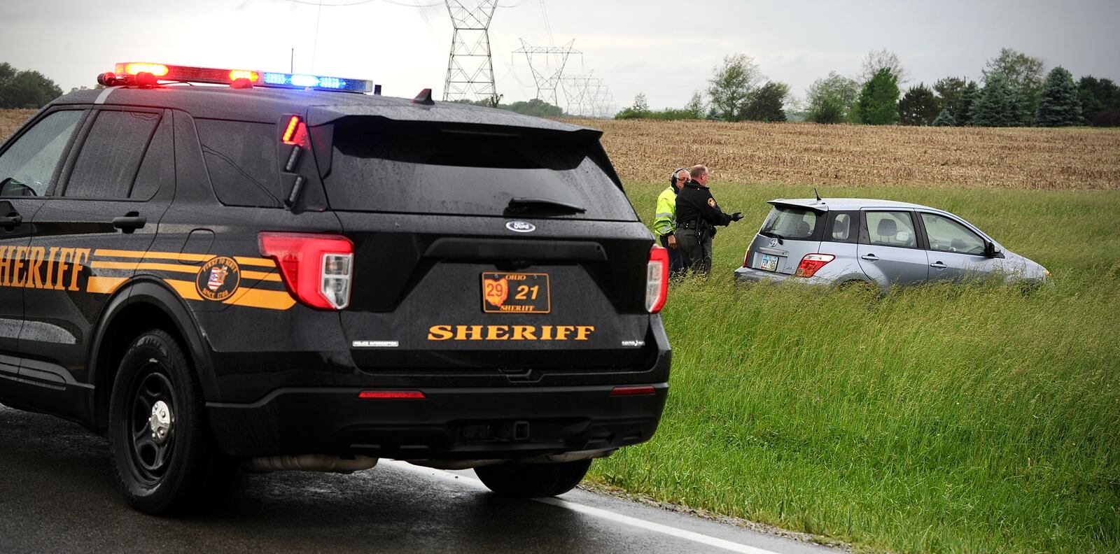 A suspect in a deadly shooting at a Xenia bar was taken into custody in the 2500 block of Wilberforce-Clifton Road following a police pursuit Thursday, May 26, 2022. MARSHALL GORBY / STAFF