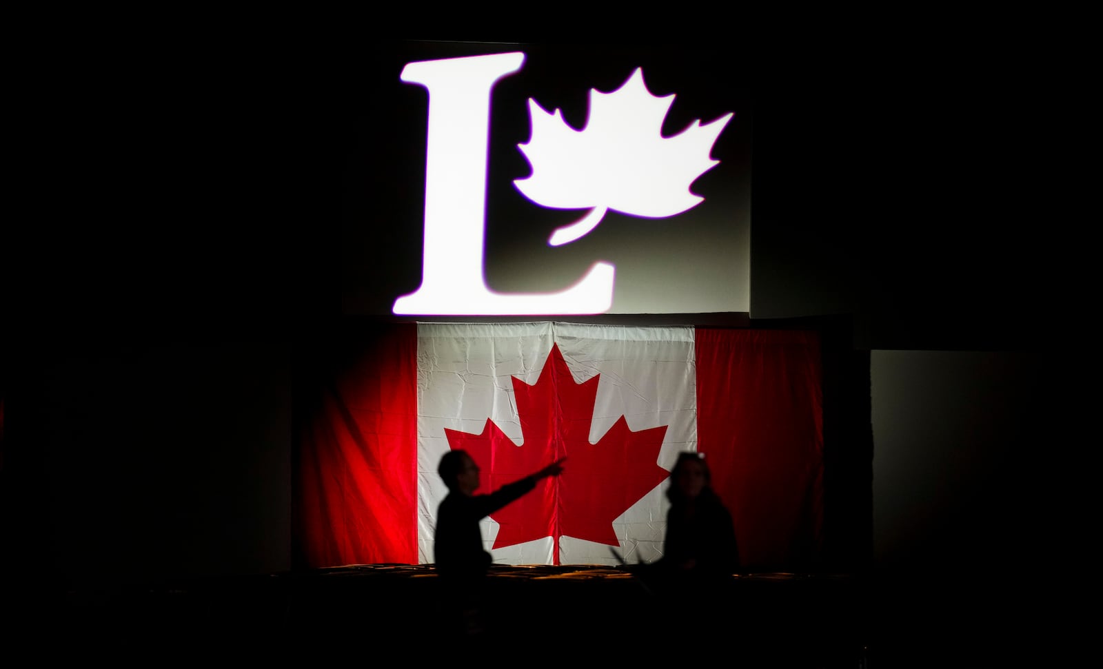 Final preparations are made for the Liberal leadership announcement in Ottawa on Sunday, March 9, 2025. (Sean Kilpatrick/The Canadian Press via AP)