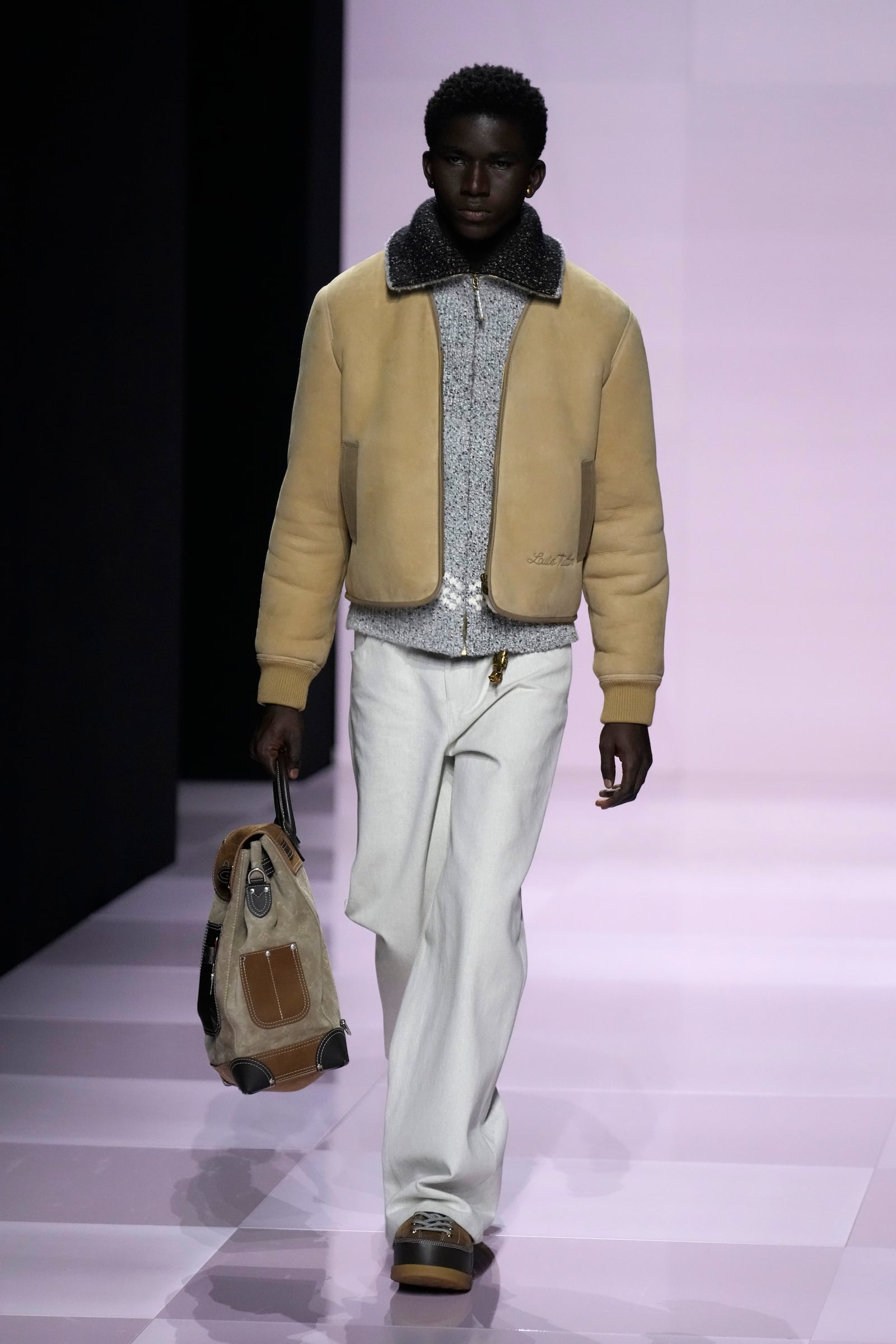 A model wears a creation as part of the men's Louis Vuitton Fall-Winter 2025-2026 collection, that was presented in Paris, Tuesday, Jan. 21, 2025. (AP Photo/Michel Euler)