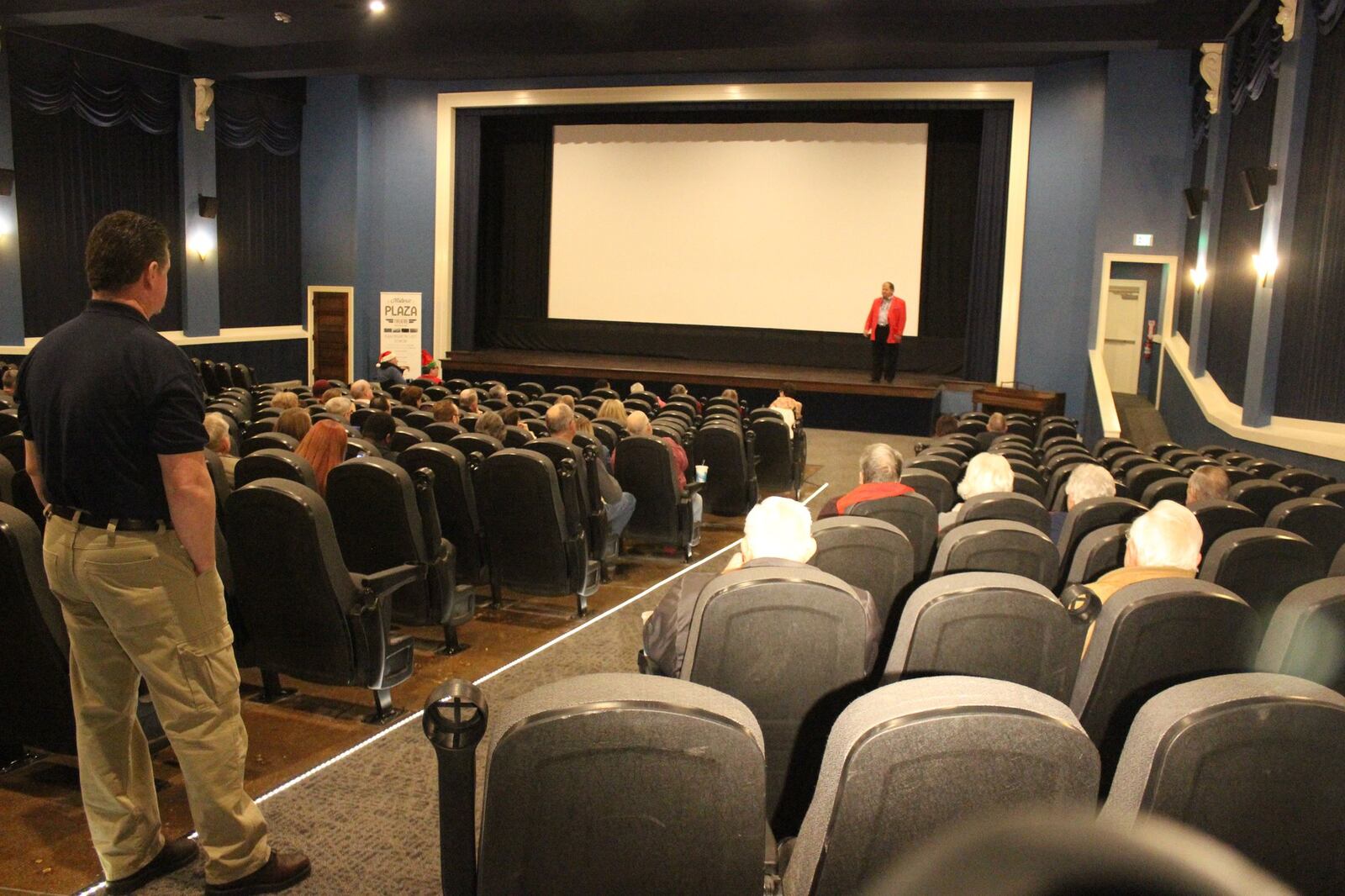 Doug Sorrell, president of the Plaza Theatre Association, helped raise $432,000 to install 285 seats, a 34-foot-tall screen, digital projection equipment and a concession area in the renovated theater in Miamisburg. It reopened Friday — on the 96th anniversary of its original grand opening — showing the “Field of Dreams.” CHUCK HAMLIN | STAFF