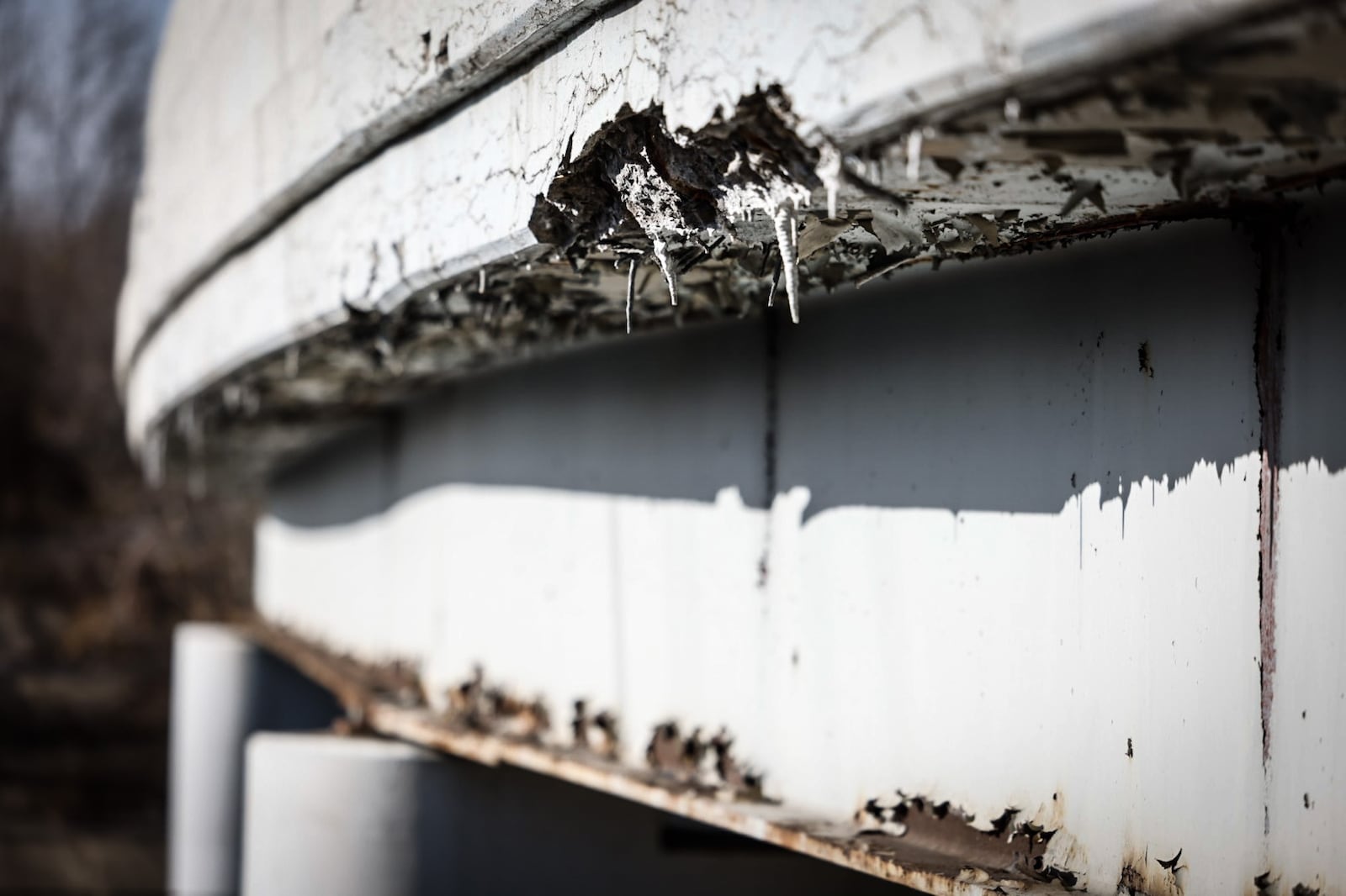 The concrete on the Ohio 4 bridge over Webster Street in Dayton is deteriorating. Construction to repair the bridge is scheduled to be begin in spring 2023, according to the Ohio Department of Transportation. JIM NOELKER/STAFF