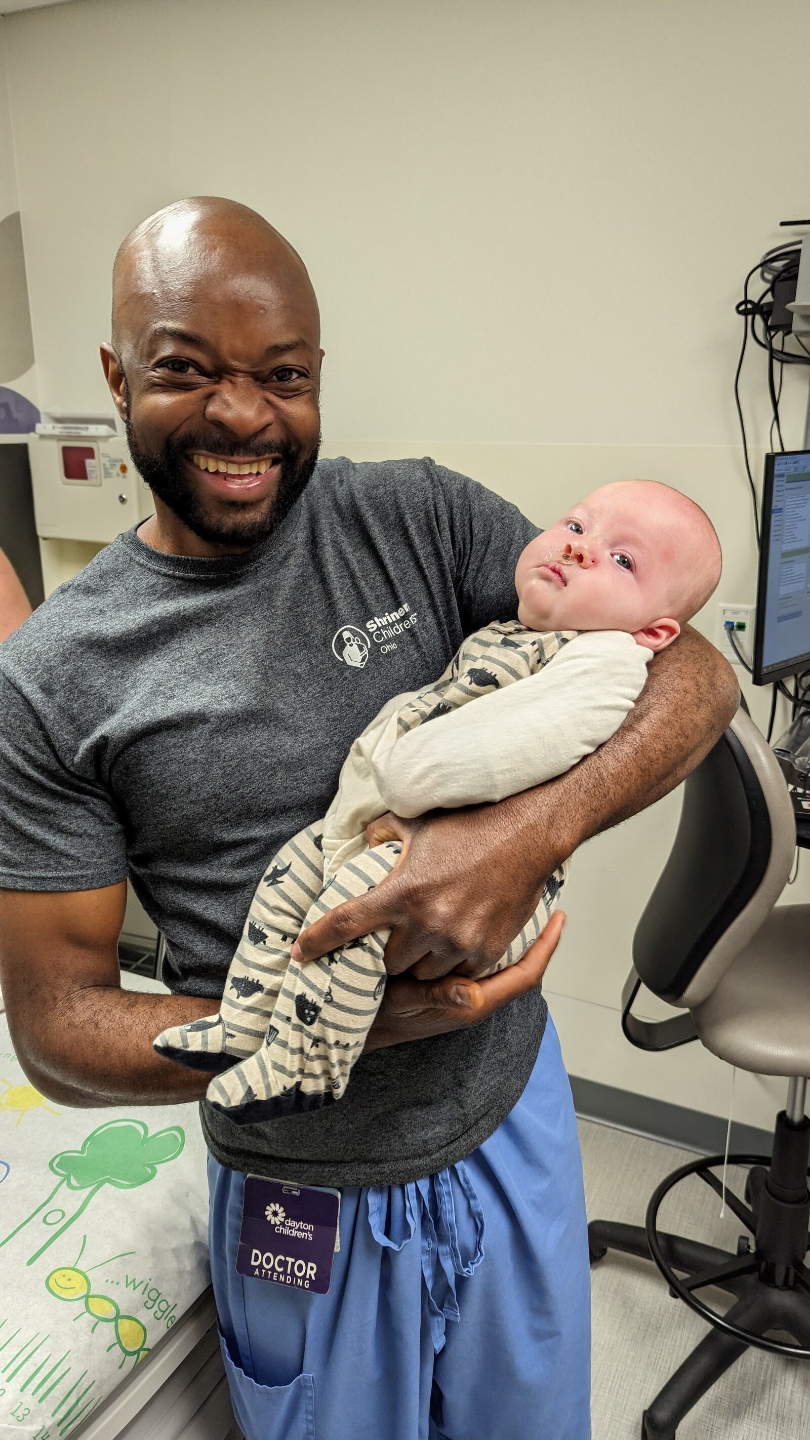 Dr. Salim Mancho, a plastic surgeon with Shriners Children's Ohio, with his patient, Case Lauf, of Springboro. Mancho completed a successful surgery on Case for his cleft lip in May 2023. CONTRIBUTED