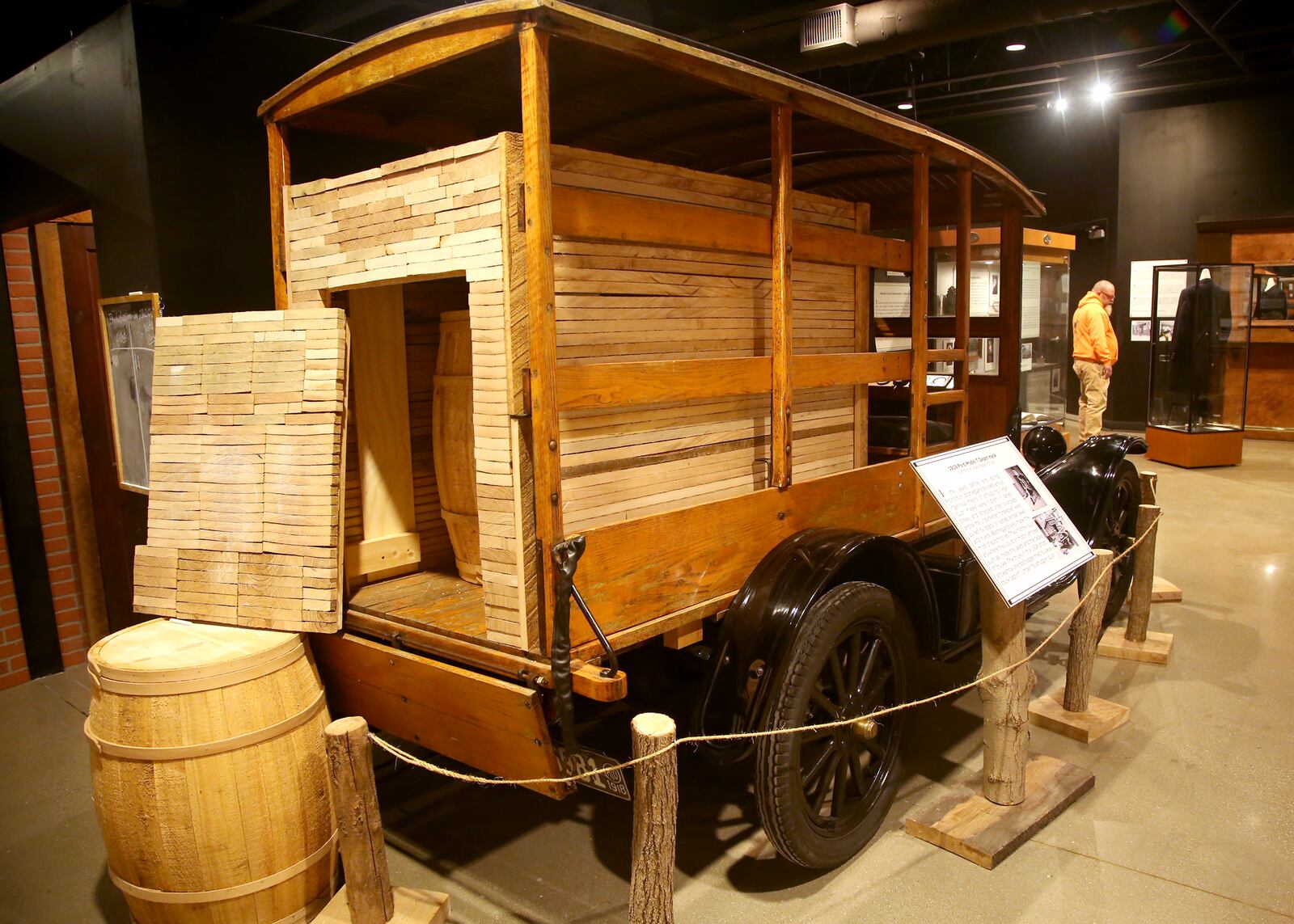 A 1919 Ford Model T, a bootleggers ride, has been cleverly disguised into a truck carrying lumber with a hidden panel protecting barrels of liquor. LISA POWELL / STAFF