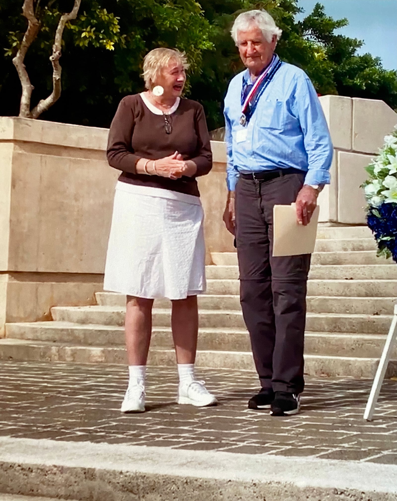 Ralph Young (R) is pictured in 2017 with his wife, Janice on the Island of Saipan in Japan where he received a medal of valor from the local people for helping save their island during World War II. CONTRIBUTED