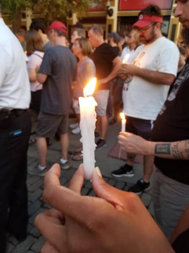 PHOTOS: Candlelight vigil in Dayton after shooting