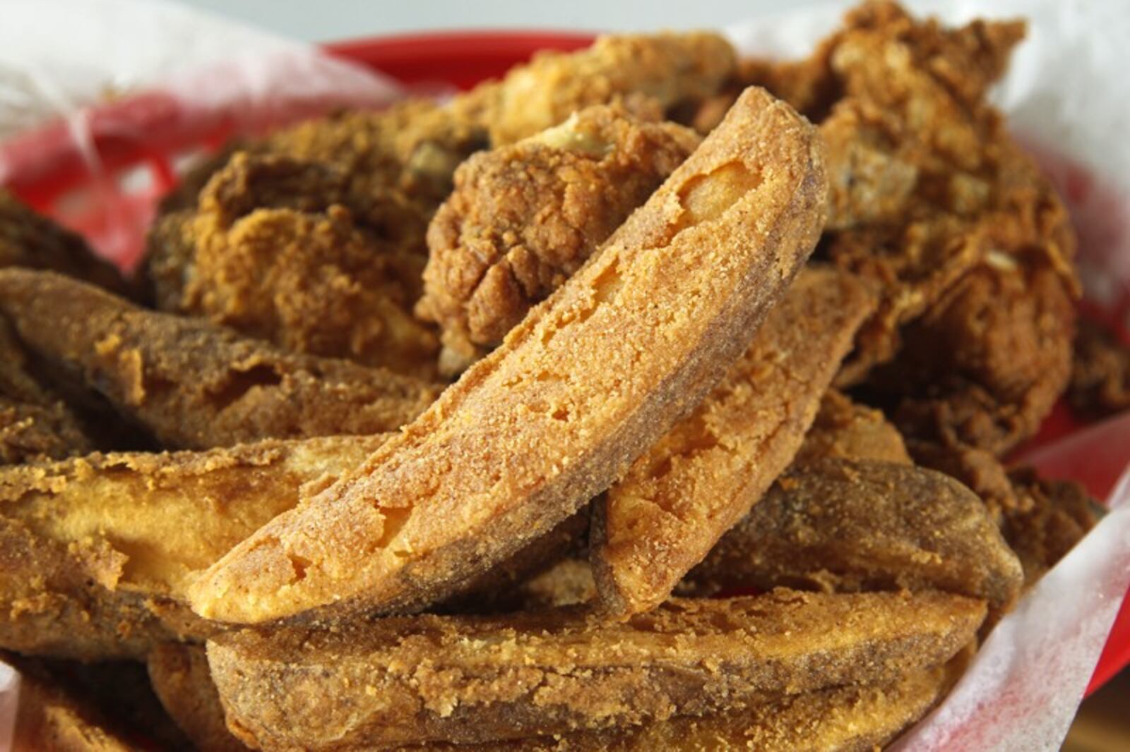 Gionino's Pizzeria serves 'Jo-Jo's', deep fried potato wedges fried in the same breading as the pizzeria's fried chicken. The pizzeria opened its first Dayton location at 1528 E. Third St. The franchise, owned by Tony Clark, has about 45 locations between Cleveland and Canton, with a Columbus location as well. LISA POWELL / STAFF