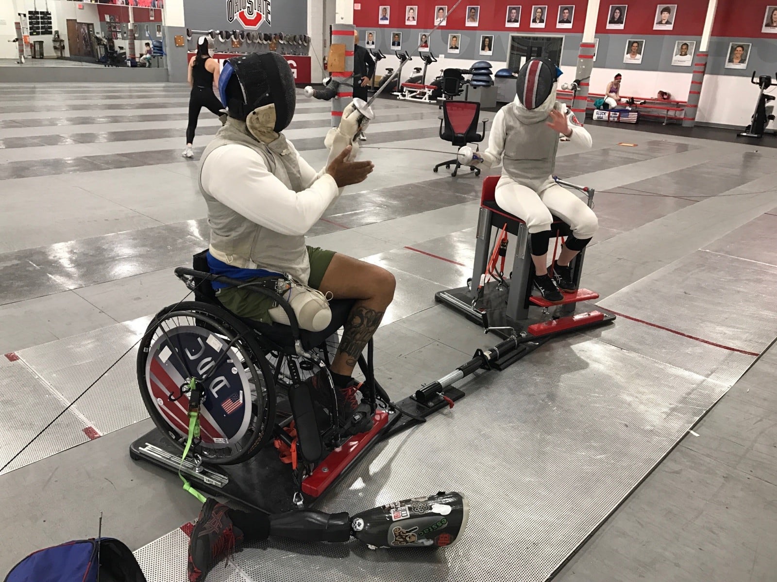 Byron Branch training a few days ago  the Steelwood Athletic Training Facility – home of Ohio State fencing – with Buckeyes fencer Anna Heiser an NYU transfer, originally from Canton. Branch – who also trains in West Chester and is back on fulltime duty as a Dayton police officer following a 2016 accident that cost him his right leg – is on the cusp of qualifying for Team USA that will compete in the 2024 Paralympic Games in Paris. His fencing, which he did prior to his injury, too, has taken him all over the world. Tom Archdeacon/CONTRIBUTED