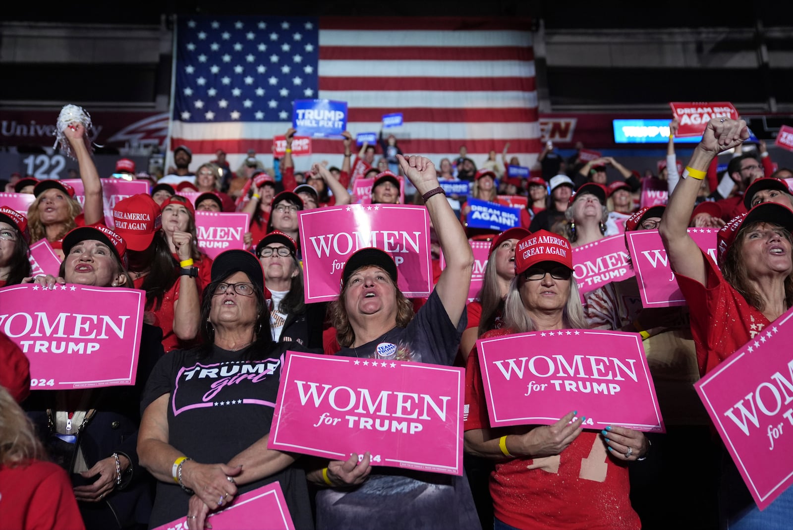 Supporters cheer as Republican presidential nominee former President Donald Trump speaks during a campaign rally at Santander Arena, Monday, Nov. 4, 2024, in Reading, Pa. (AP Photo/Evan Vucci)