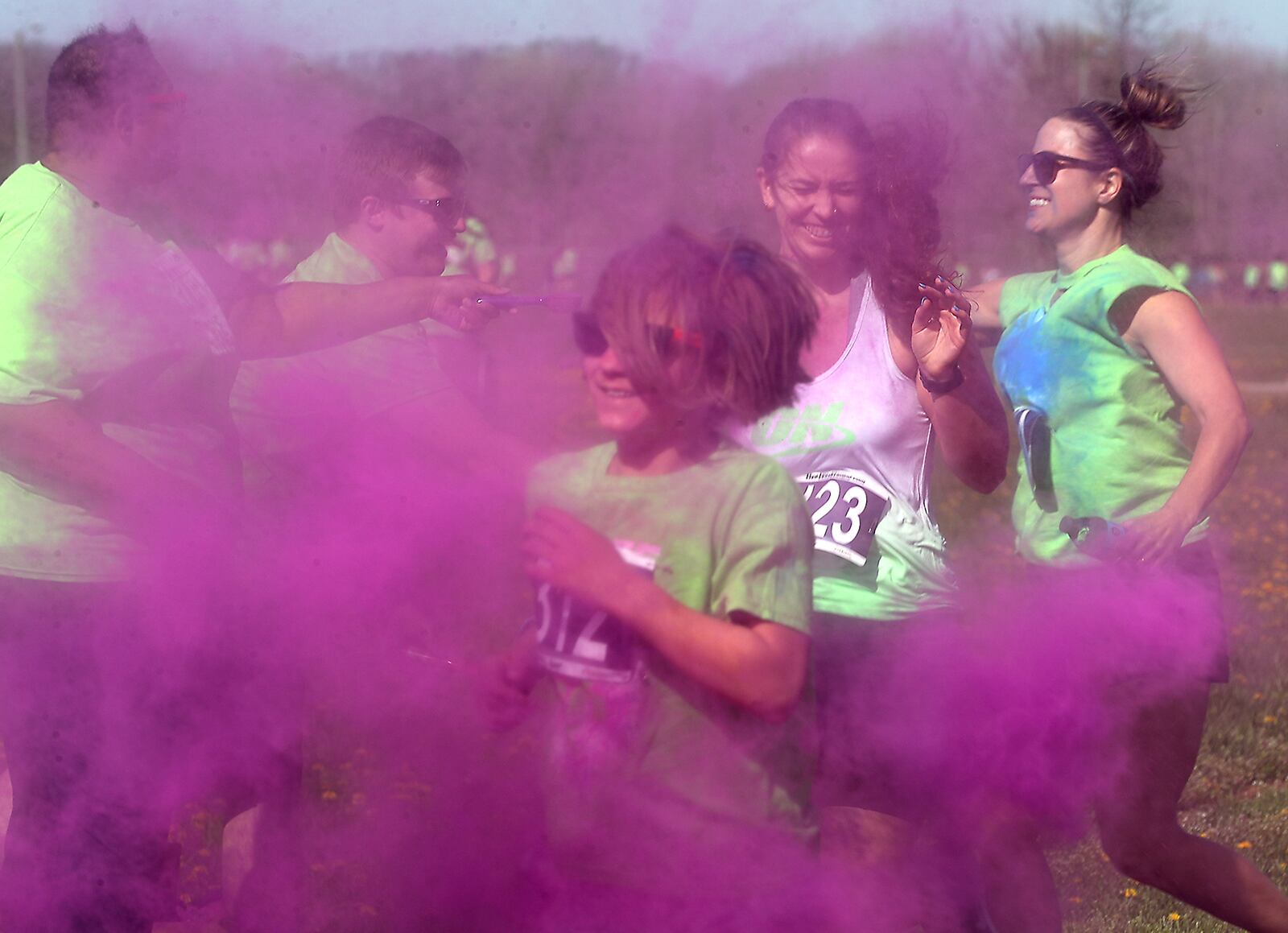 Clark County's most colorful benefit, the Dye Hard 5K Race/Walk was held Sunday, April 24, 2022 at the Clark County Fairgrounds. Hundreds of people participated in the annual event that benefits people with developmental desabilties. As runners and walkers made their way around the course colorful powder was thrown on them at different stations. BILL LACKEY/STAFF