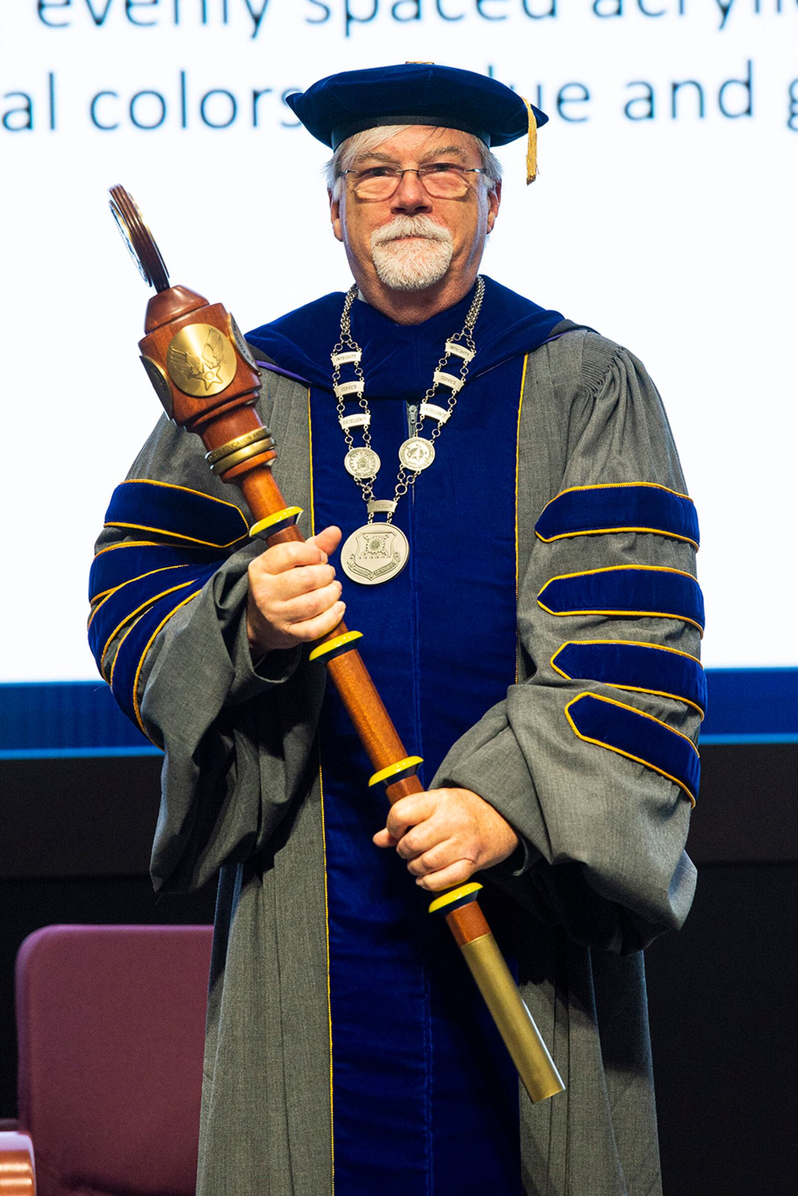 Dr. Walter Jones assumes the role of Air Force Institute of Technology director and chancellor during a ceremony July 27 at Wright-Patterson Air Force Base. Jones is the 50th AFIT leader and only the second civilian. U.S. AIR FORCE PHOTO/WESLEY FARNSWORTH