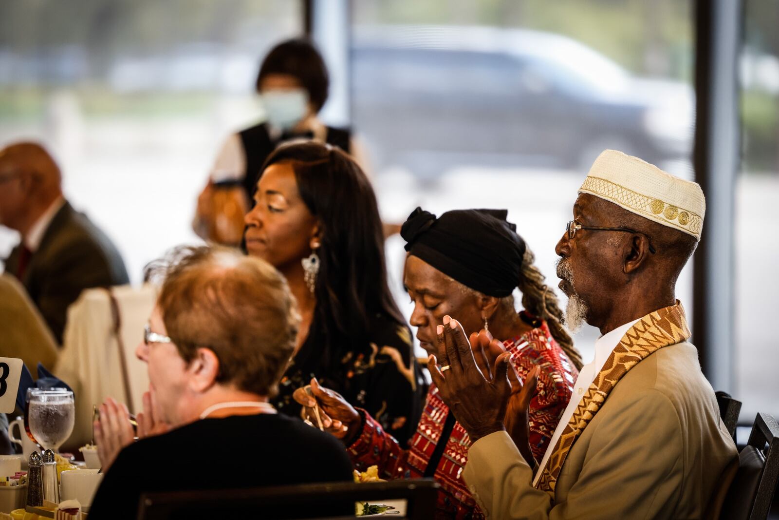 Attendees listen to remarks from inductees during the 2020 Dayton Walk of Fame celebration held Tuesday morning  Oct. 12, 2021 at Sinclair Community College. The Walk of Fame recognizes the lives of accomplishments of individuals from the Greater Miami Valley area. Some notables from Tuesday event are, Gov. Mike DeWine and Springfield entertainer, John Legend. JIM NOELKER/STAFF