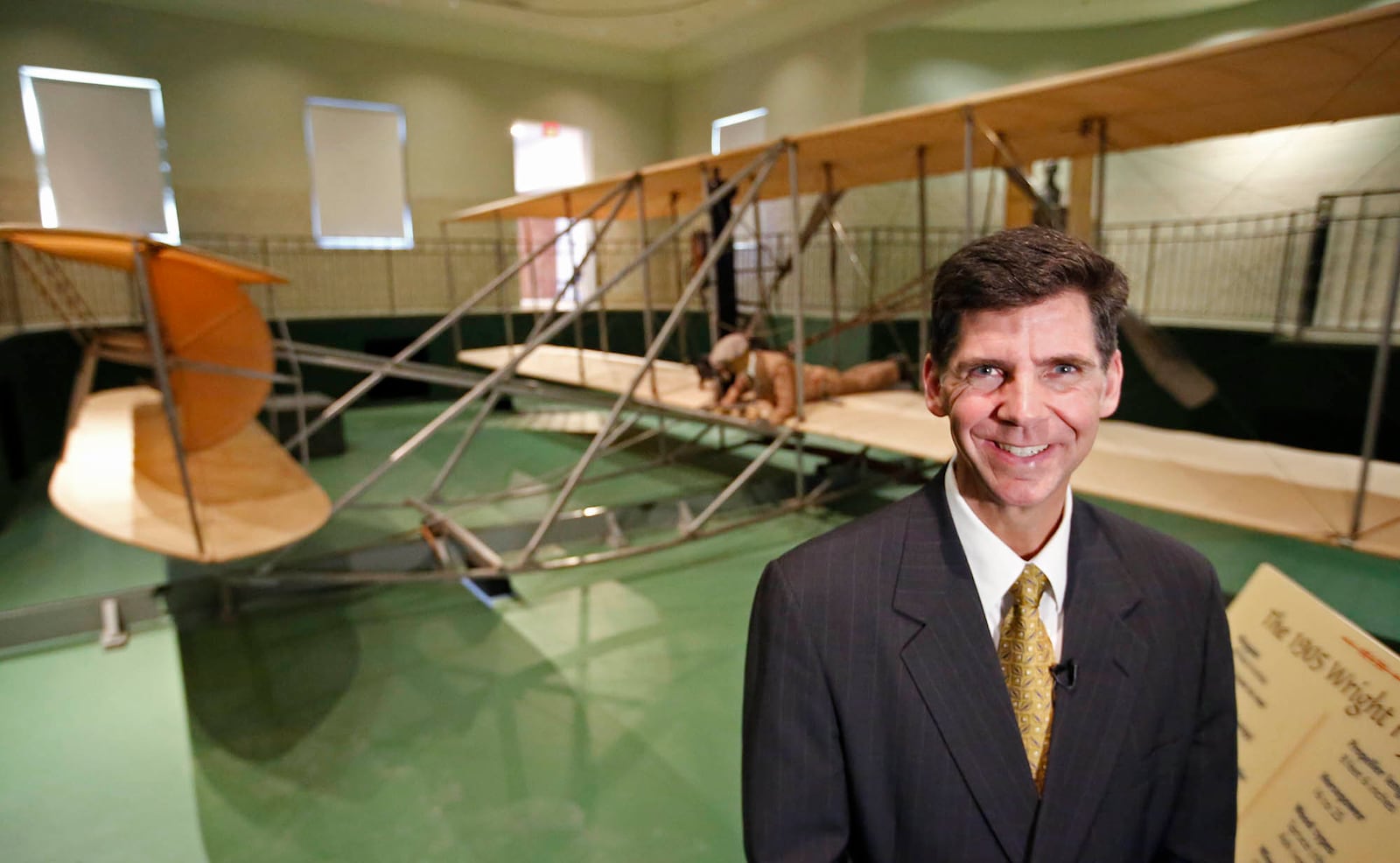 Brady Kress, Dayton History president and chief executive, with an original 1905 Wright Flyer III in a building at Carillon Park designed by Orville Wright. This airplane was flown at Huffman Prairie by the Wrights and is considered the first practical airplane as it was controlled in climb, descent, turn and bank in ever increasing duration. TY GREENLEES / STAFF