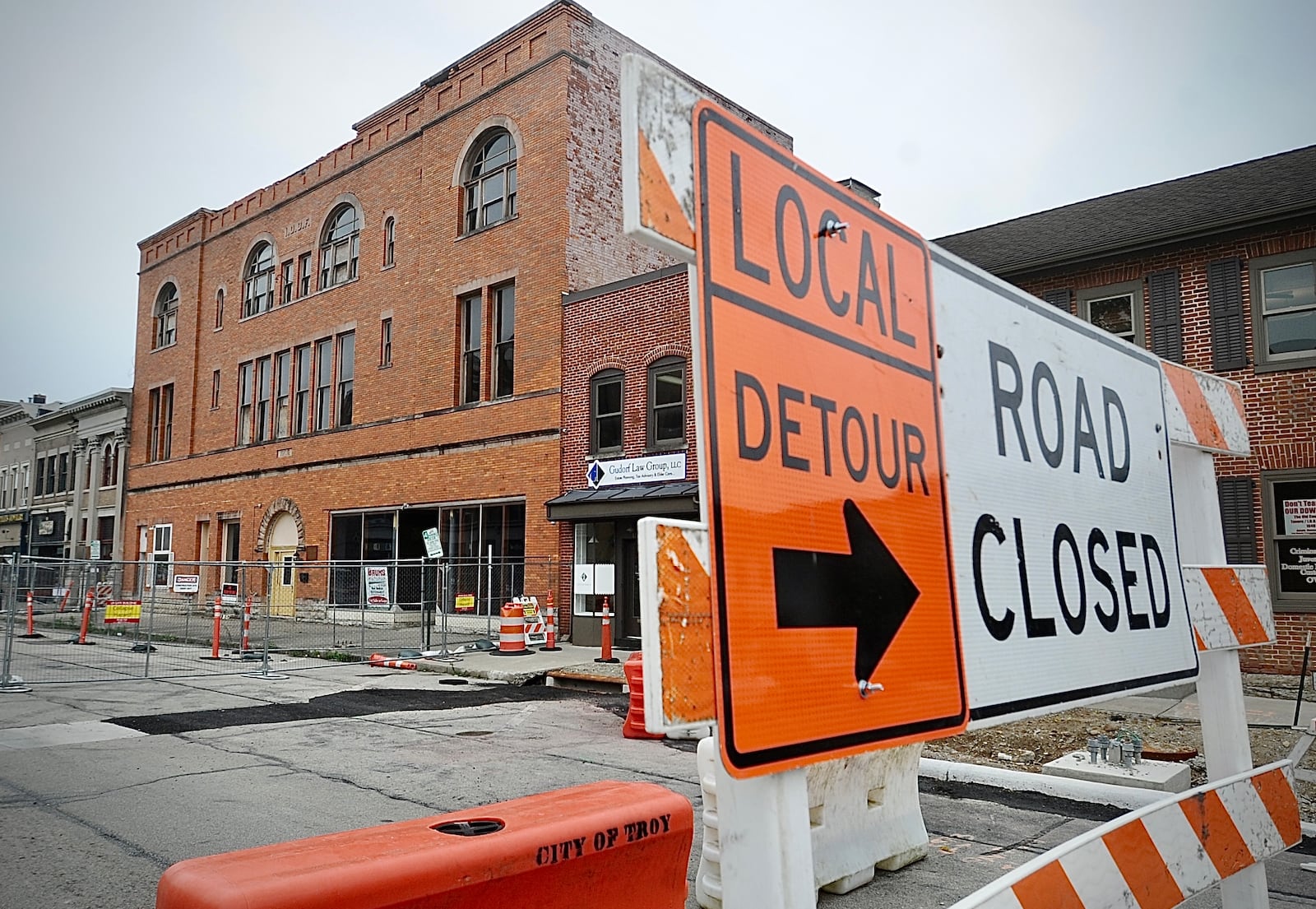 The 100 block of West Main Street in Troy is completely blocked off June 27, 2023, after city officials declared the controversial Tavern building there unsafe. MARSHALL GORBY \STAFF