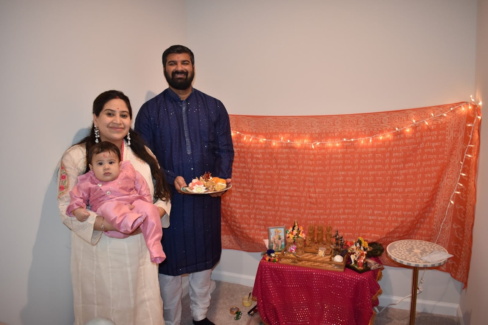 Avneesh, Nikhita and Om Aggarwal celebrating Diwali when Om was 8 months old. CONTRIBUTED