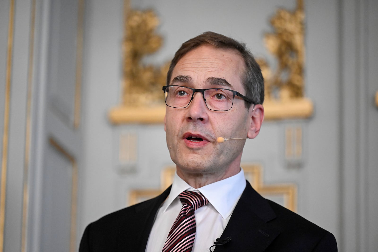 Swedish Academy's permanent secretary Mats Malm announces the winner of the 2024 Nobel Prize in Literature, South Korean writer Han Kang, at the Swedish Academy in Stockholm, Sweden, Thursday Oct. 10, 2024. (Jessica Gow/TT News Agency via AP)