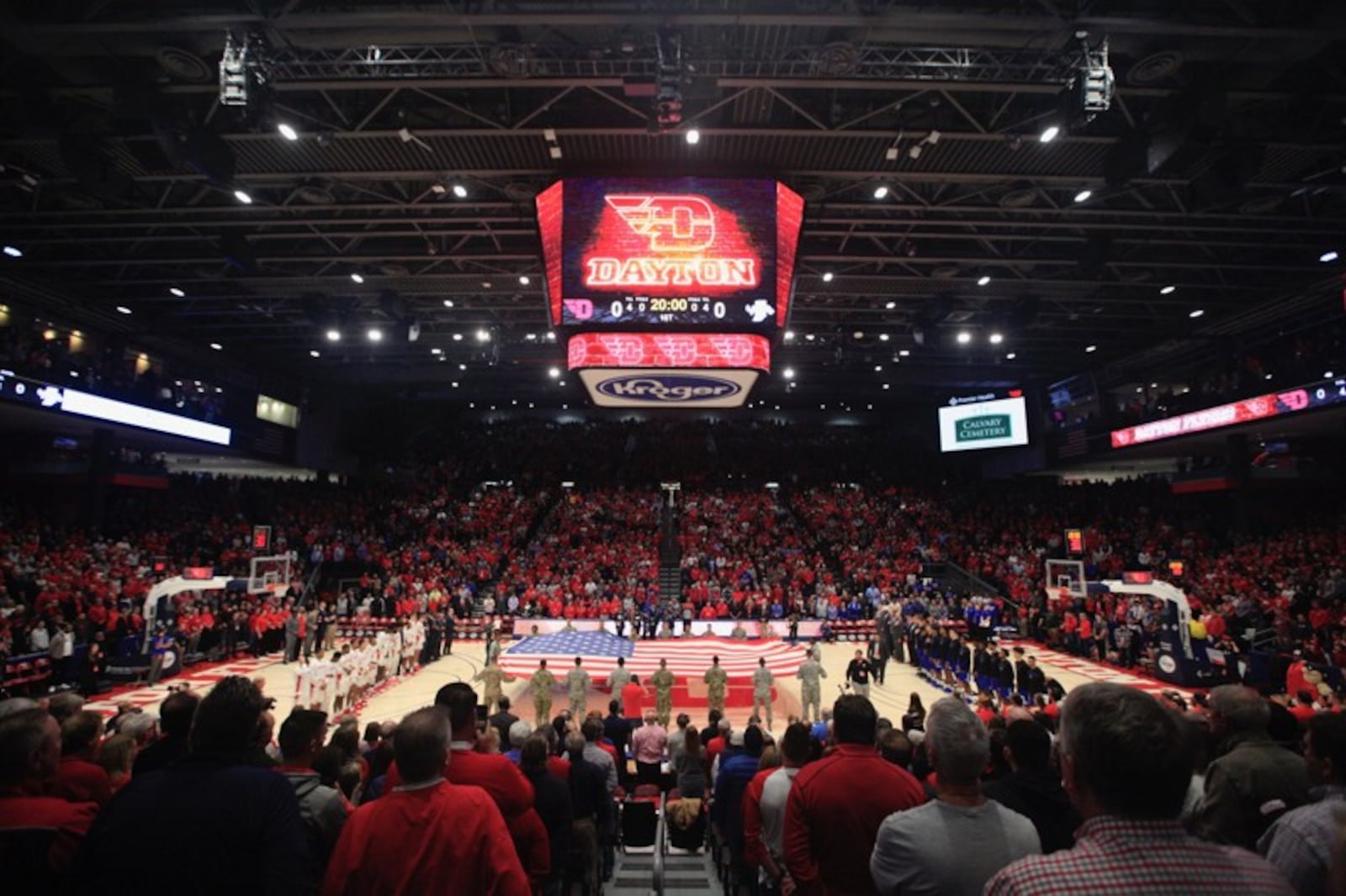 Fans stand for the national anthem before a game between Dayton and Indiana State on Saturday, Nov. 9, 2019, at UD Arena. David Jablonski/Staff