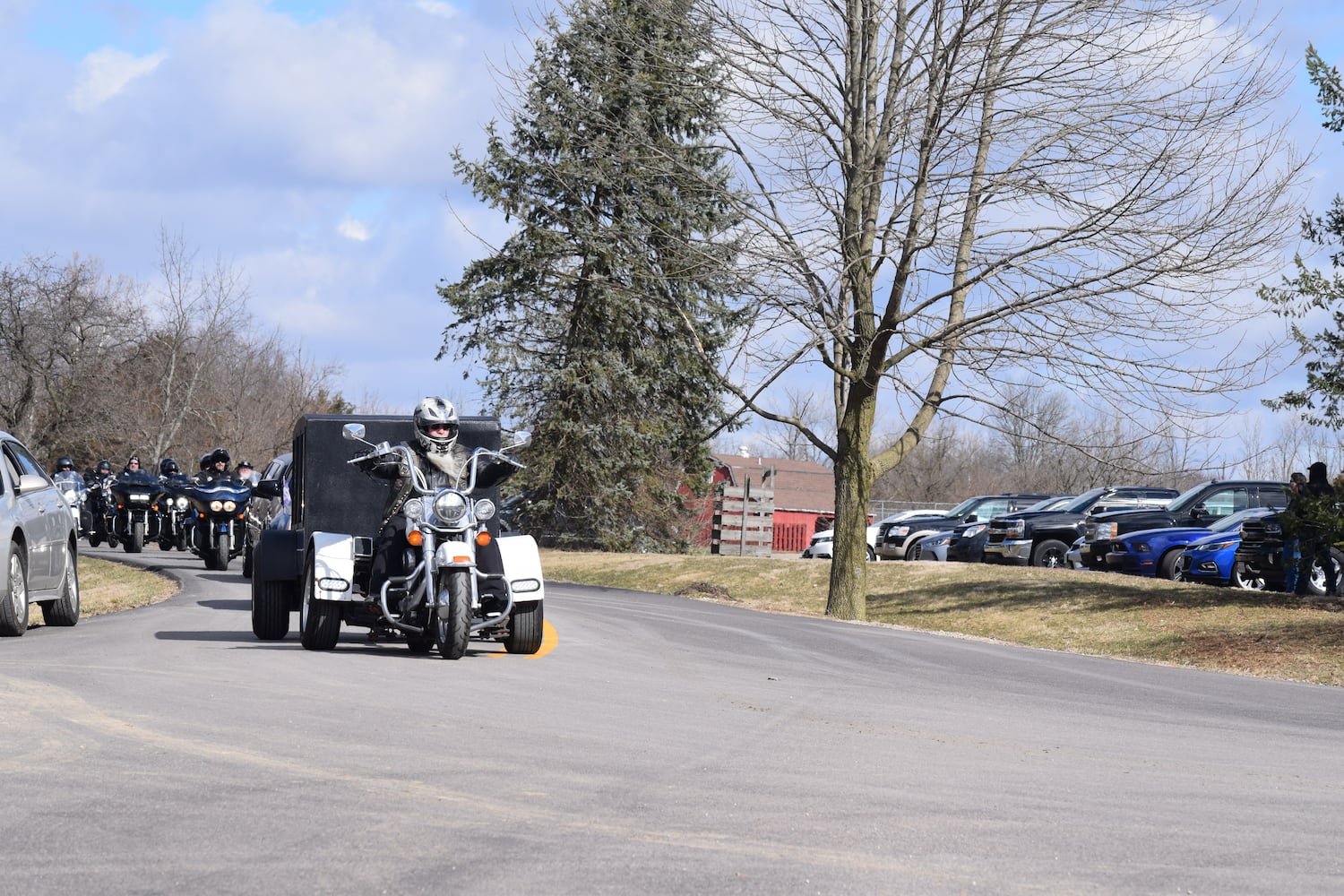 PHOTOS: Thousands of Outlaws attend motorcycle gang leaders funeral at Montgomery County Fairgrounds.