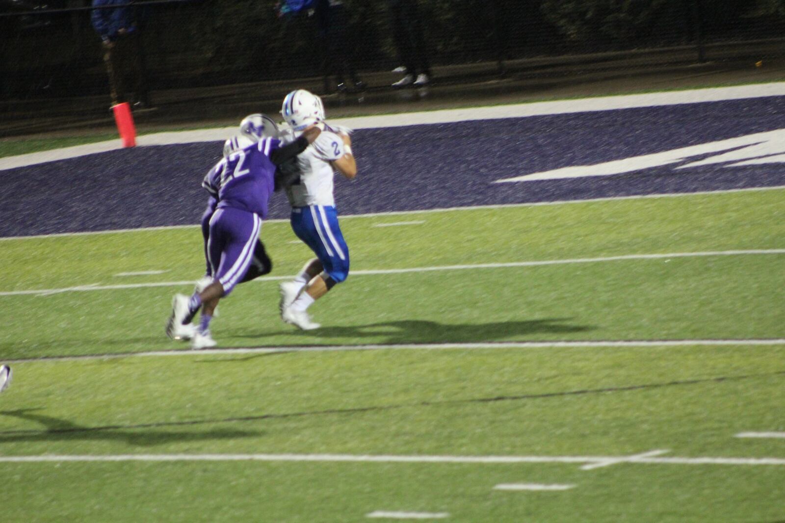 Springboro’s Ronnie Arthur (2) is caught from behind by Middletown’s Kailon Johnson during Friday night’s game at Barnitz Stadium in Middletown. CONTRIBUTED PHOTO BY MARITZA MCKINNEY