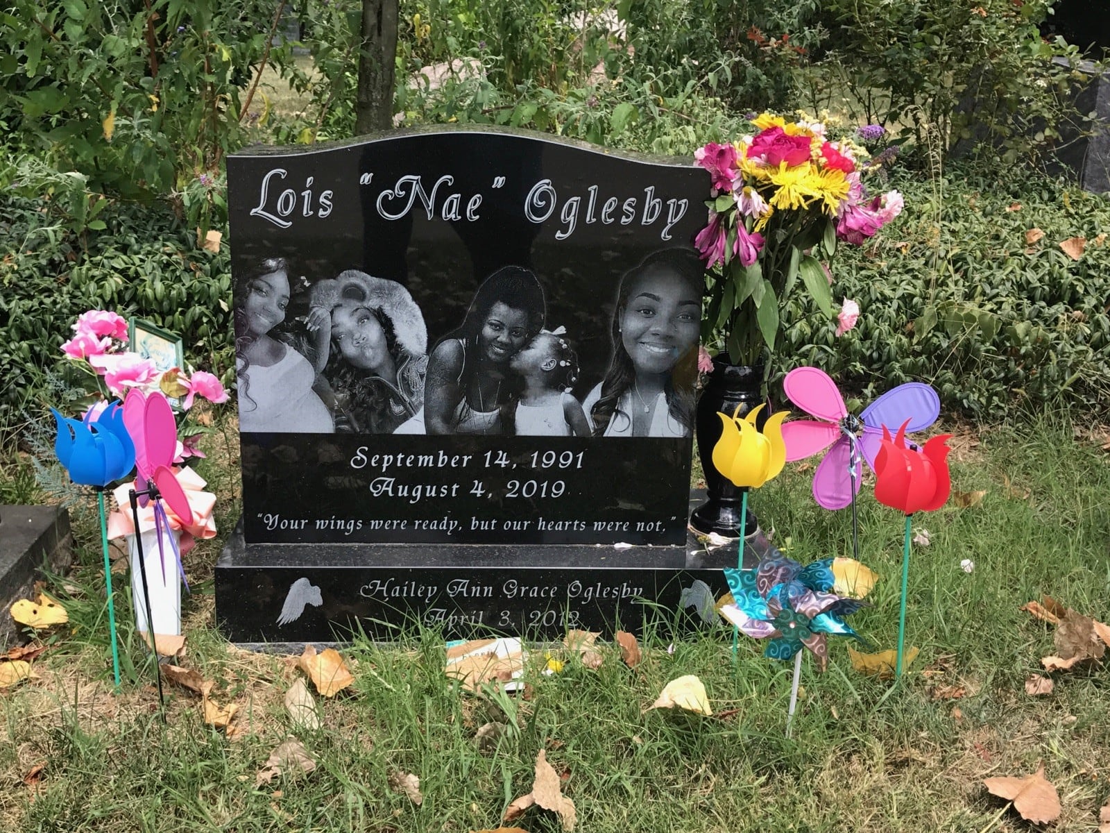 The grave of Lois “Nae” Oglesby at Woodland Cemetery is also a place the family celebrates her life and that of daughter Hailey, who was stillborn. Portraits of Lois smiling, having fun, and getting a kiss from daughter Hannah, Hailey’s twin, are etched on the gravestone. Toys, pinwheels, and flowers have been left there by her daughters Hannah, now 12 and Reign, 5. Tom Archdeacon/CONTRIBUTED