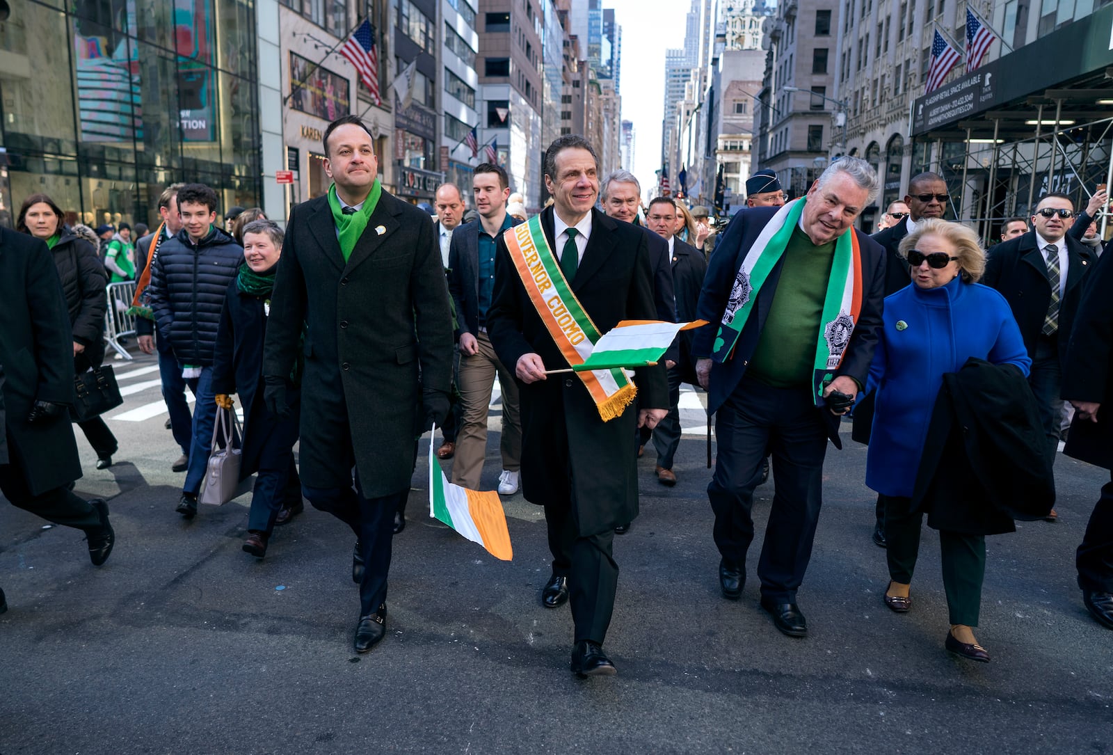 FILE - From center left, Irish Prime Minister Leo Varadkar, New York Democratic Gov. Andrew Cuomo and Rep. Peter King, R-N.Y., walk along Fifth Avenue during the St. Patrick's Day parade Saturday, March 17, 2018, in New York. (AP Photo/Craig Ruttle, File)