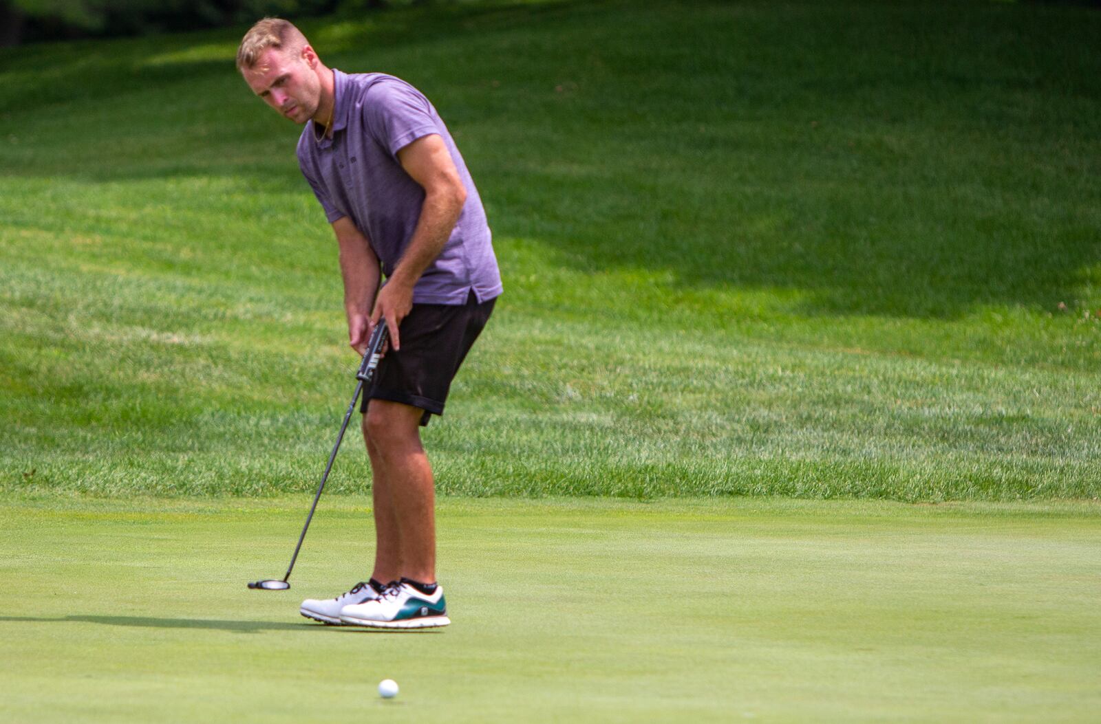 Bryce Haney hits a putt on the back nine of Sunday's final round at the Golf Club at Yankee Trace Golf in Centerville. Jeff Gilbert/CONTRIBUTED